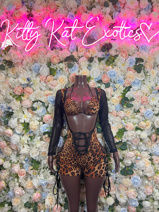 Leopard print bodysuit with black sheer long sleeves and lace-up waist cutouts