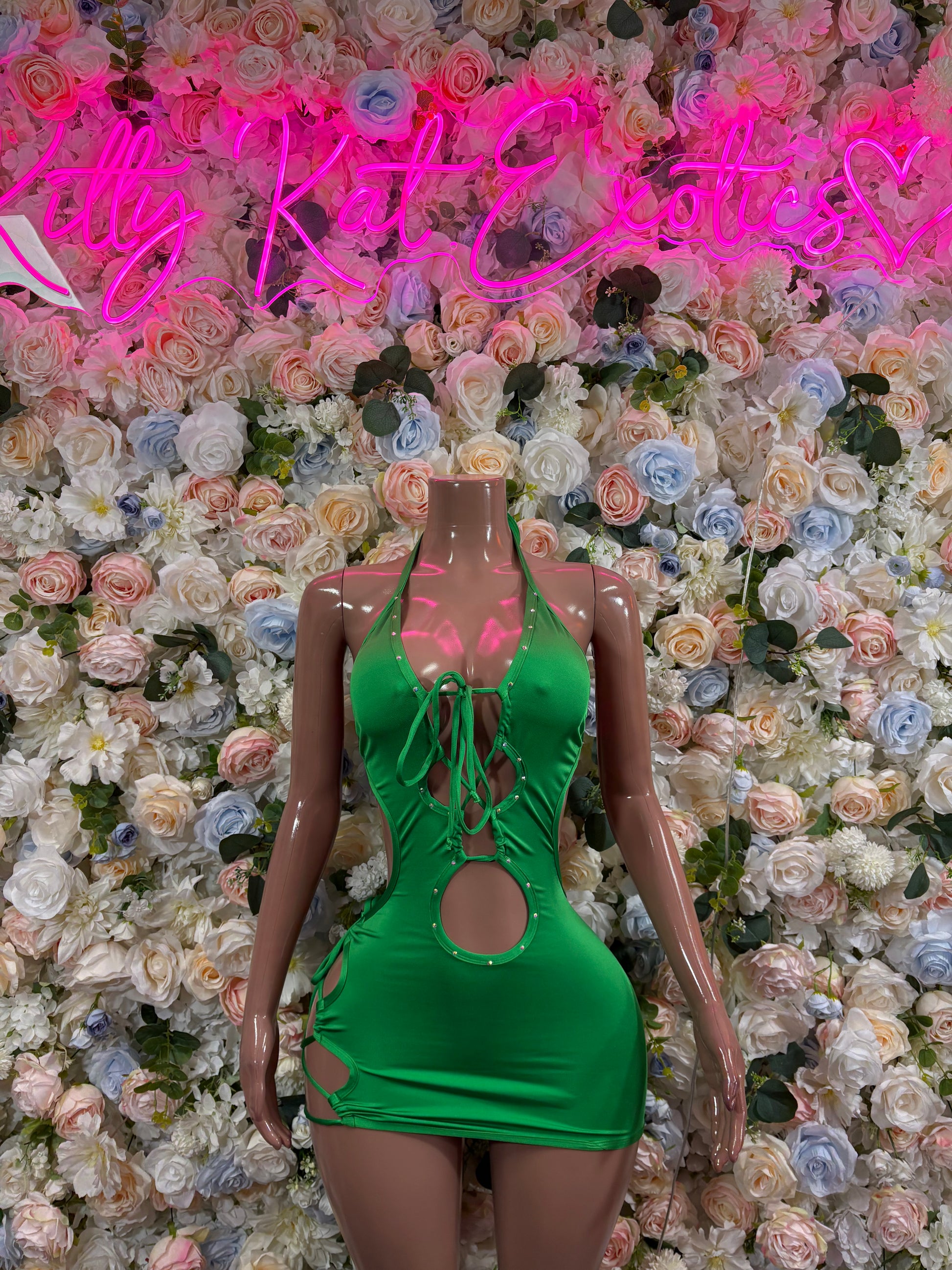 Green mini bodysuit dress with halter straps and front cutout