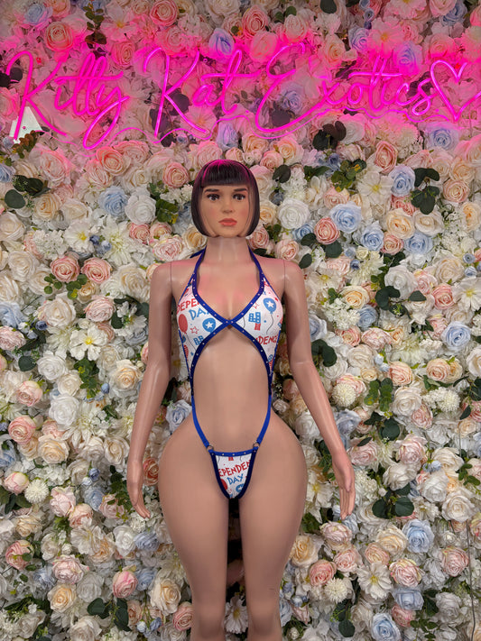 Patriotic one-piece bodysuit with blue triangle straps and red, white, blue print