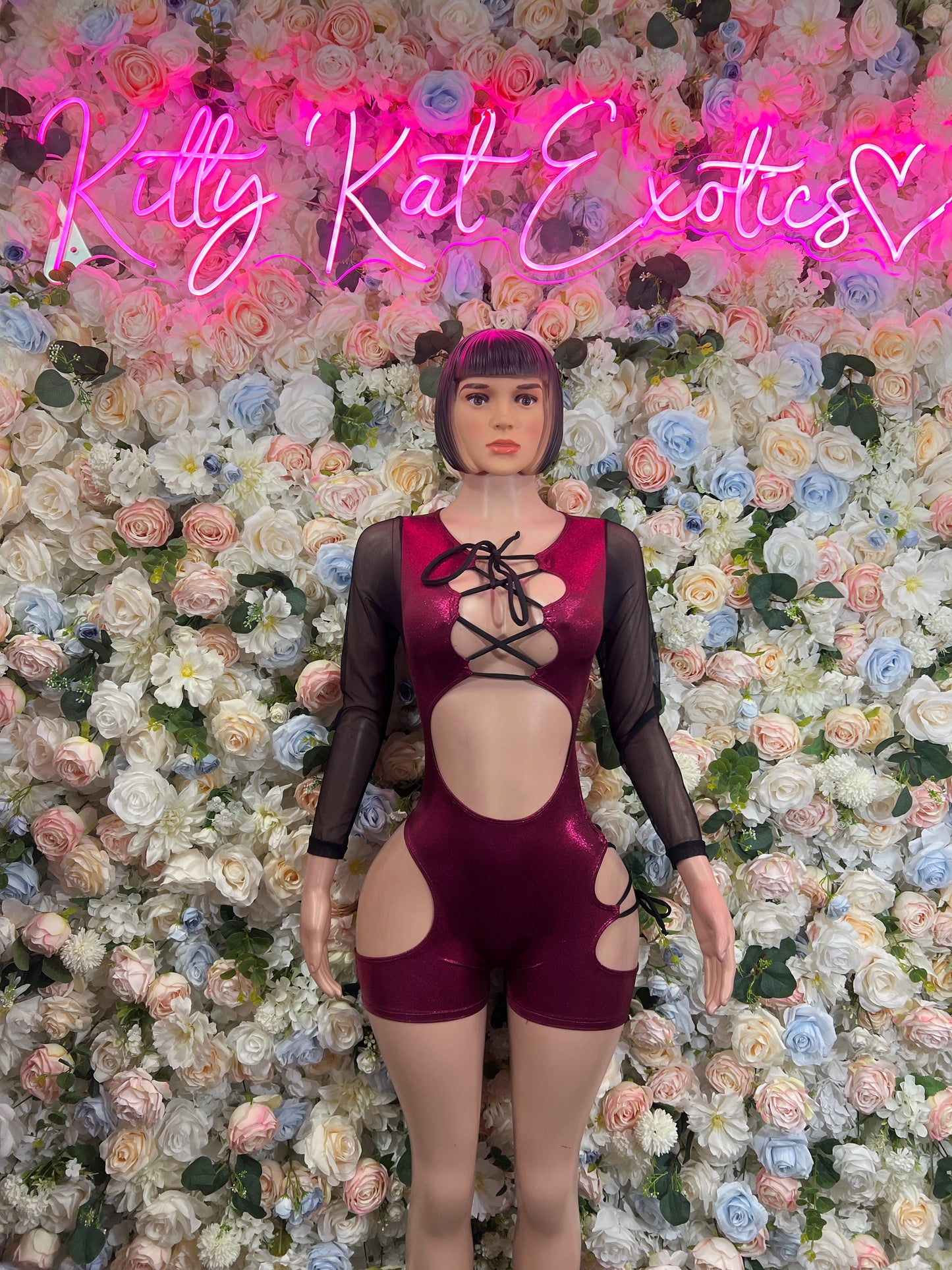Burgundy lace-up dance bodysuit with long sheer sleeves and high-cut shorts