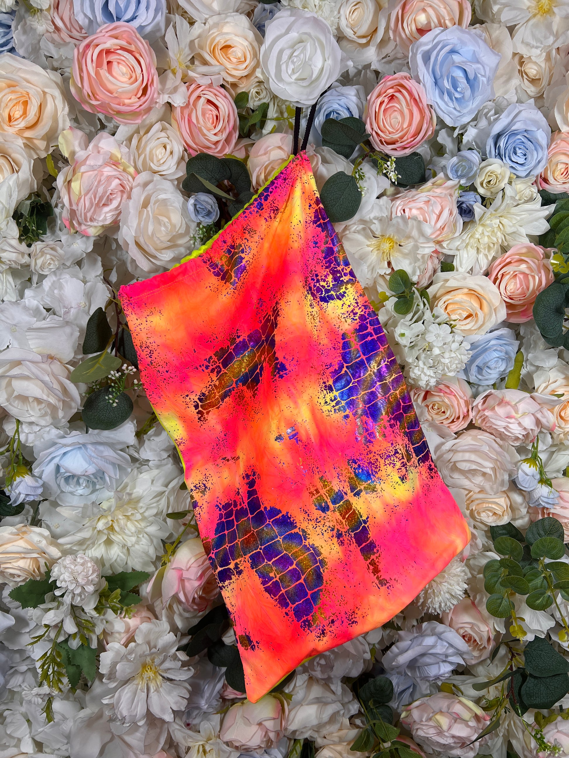 Neon multicolor money bag with purple-orange gradient and textured grid pattern