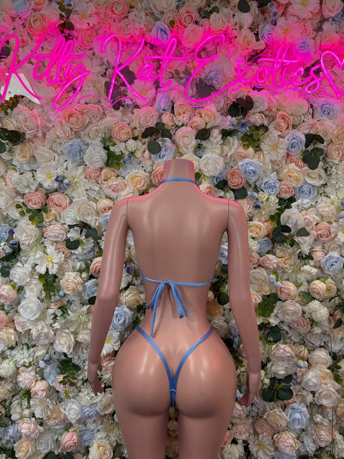 Blue bikini set with open back tie string and matching high-cut bottoms