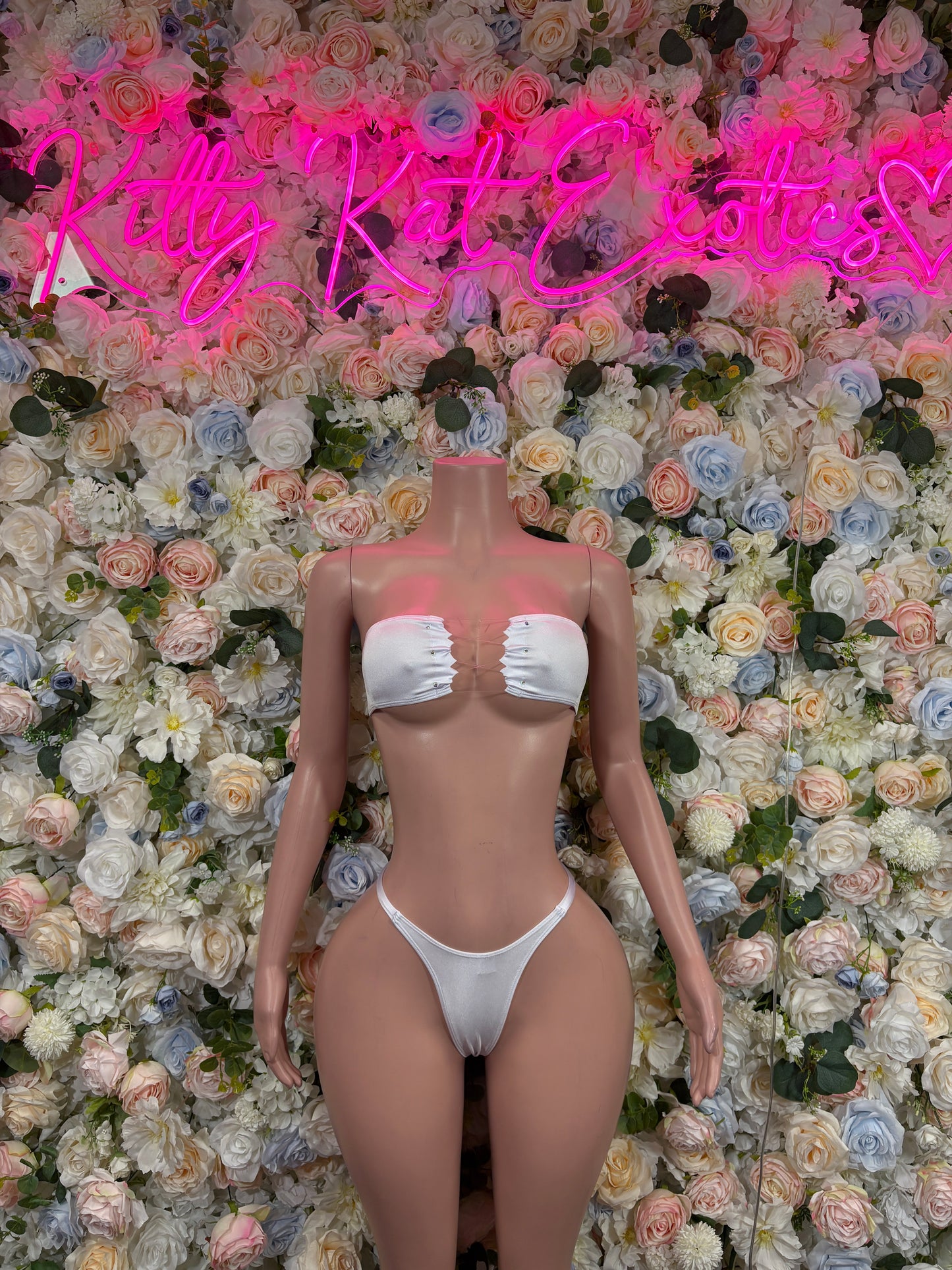 White bandeau bikini top and high-cut bikini bottom set