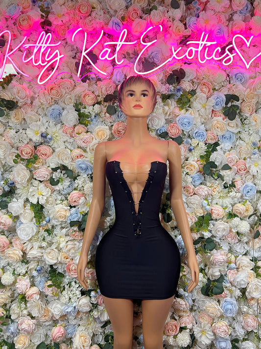 Black sequined mini dress with plunging V neckline and fitted corset bodice
