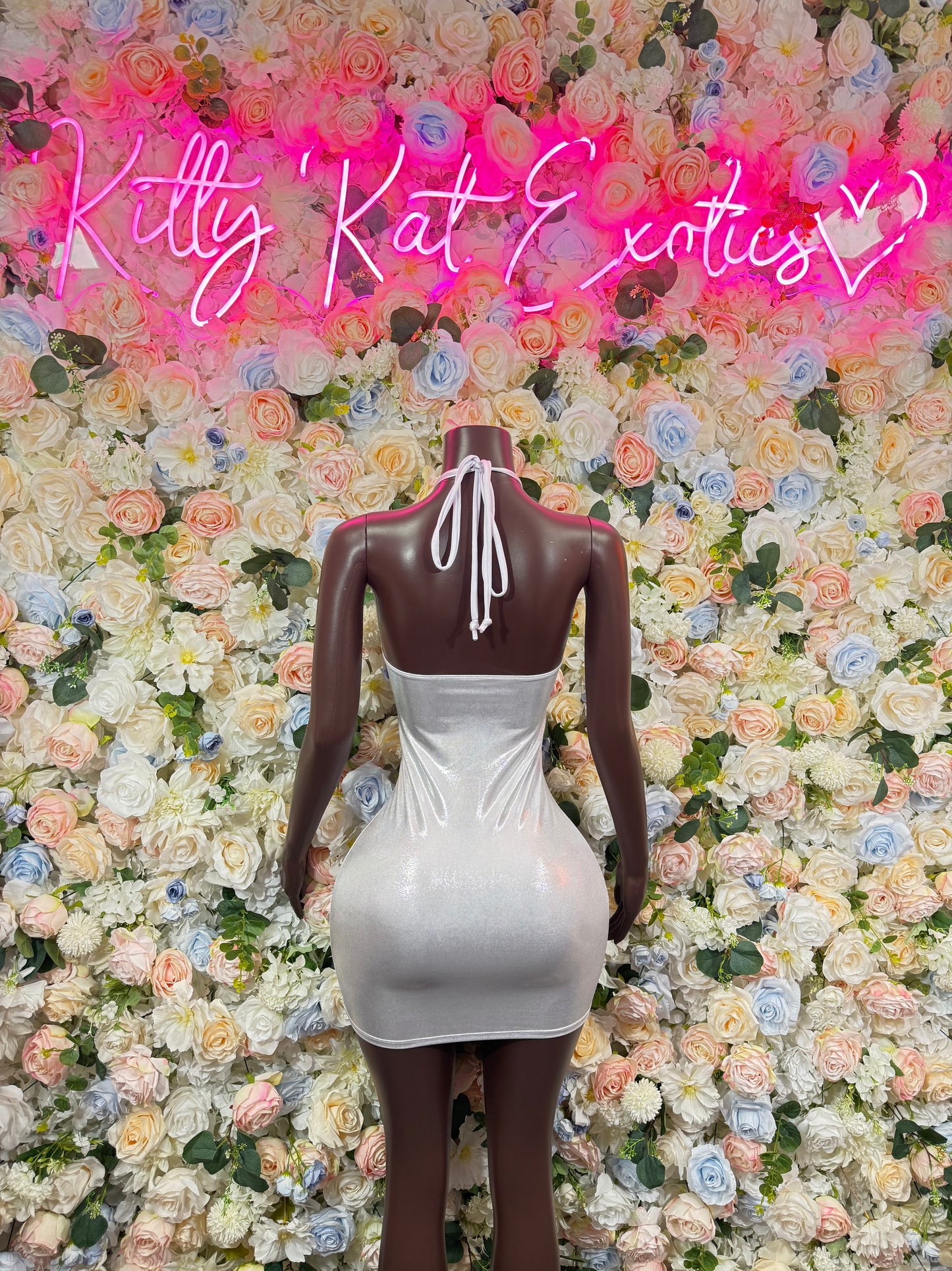 Metallic white mini dress, back view, keyhole cutout and gathered shoulder ties