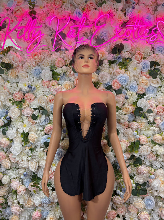 Black strapless one-piece mini dress with sweetheart neckline and central cutout