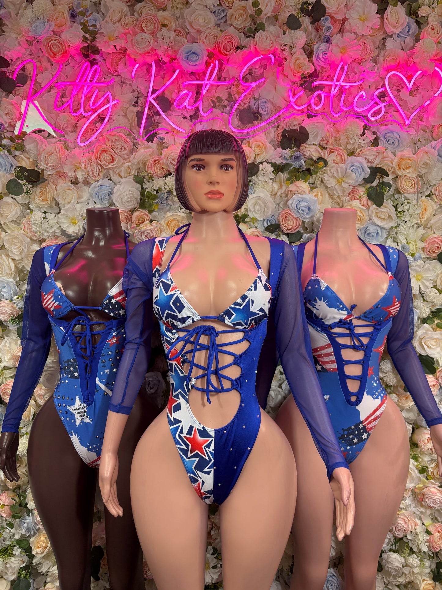 Patriotic star-print bodysuit with crisscross lace-up front and blue long sleeves