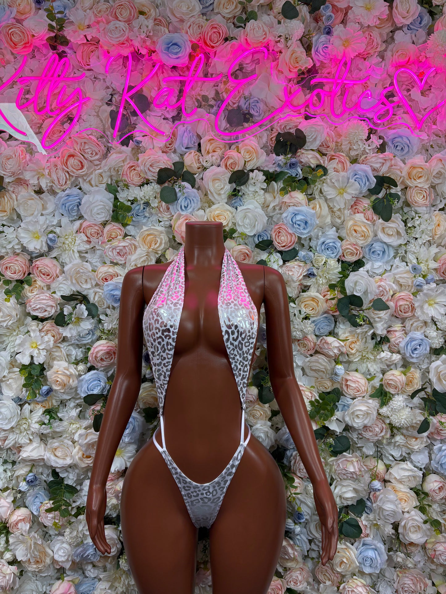 Silver cheetah hologram bodysuit with deep V front and high-cut legs