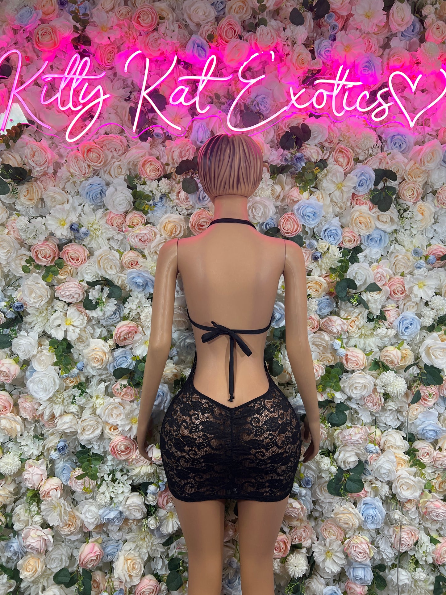 Black mini dress, lace back with bow tie and open back detail