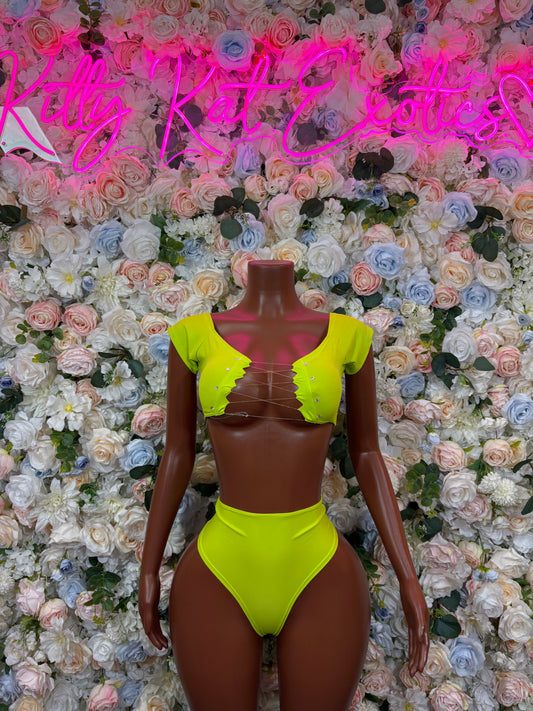 Neon green rave two-piece: off-shoulder crop top and high-cut bikini bottoms