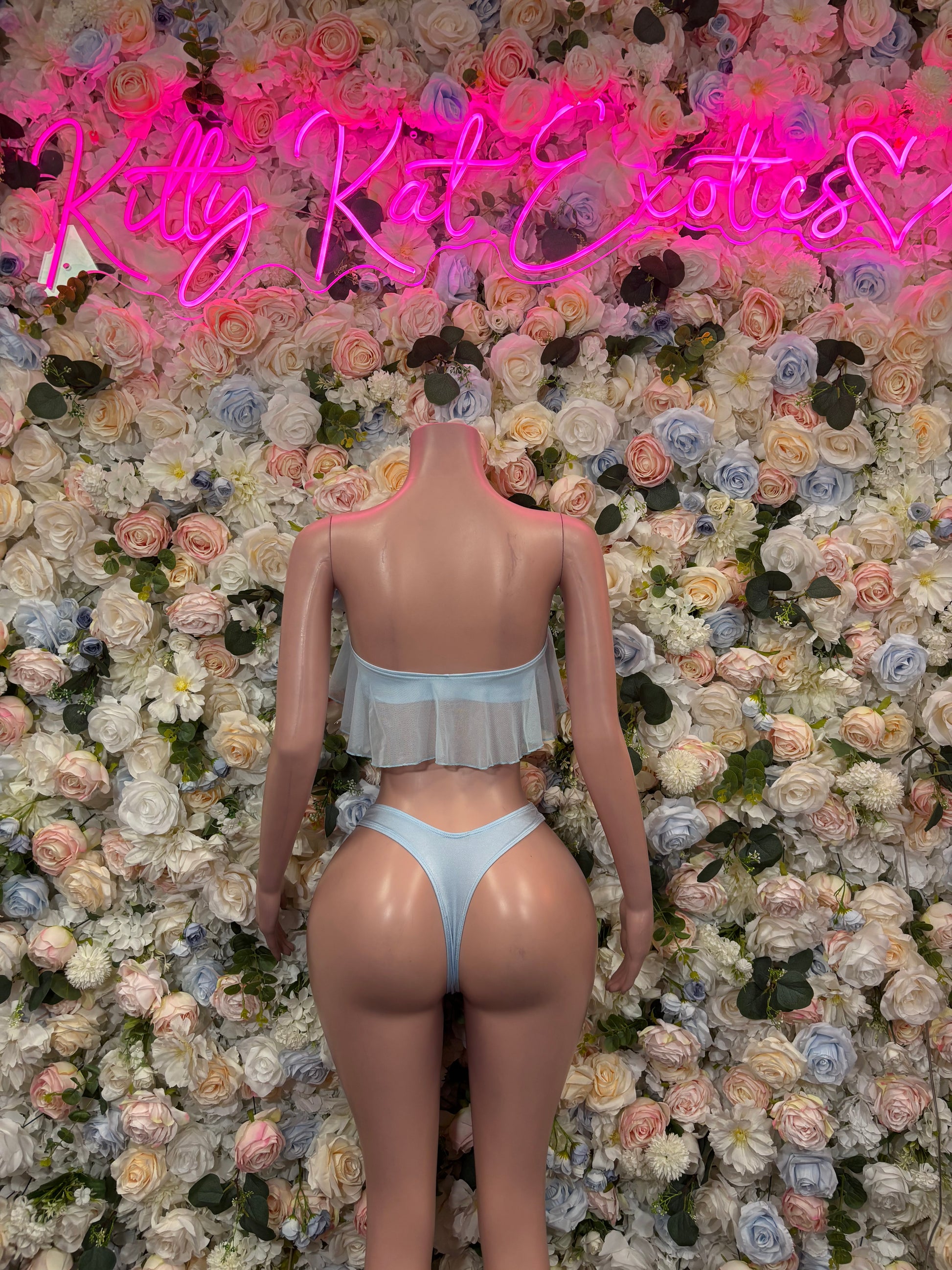Light blue two-piece rave outfit with ruffled bandeau top and string bikini bottoms