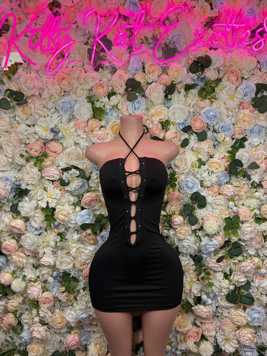 Black backless mini dress with center lace-up panel and crisscross straps