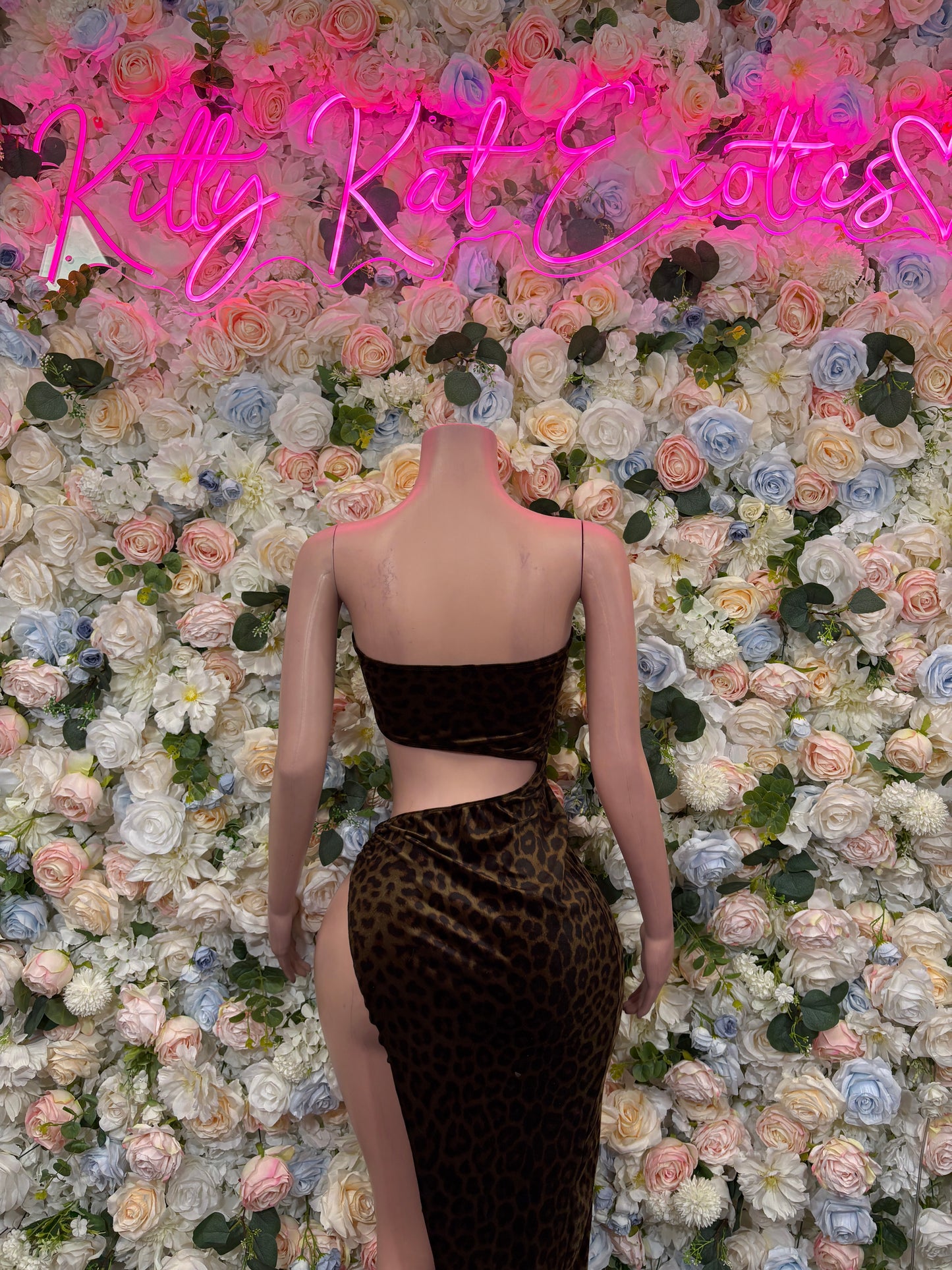 Leopard-print velvet gown with open back and high-cut bodice