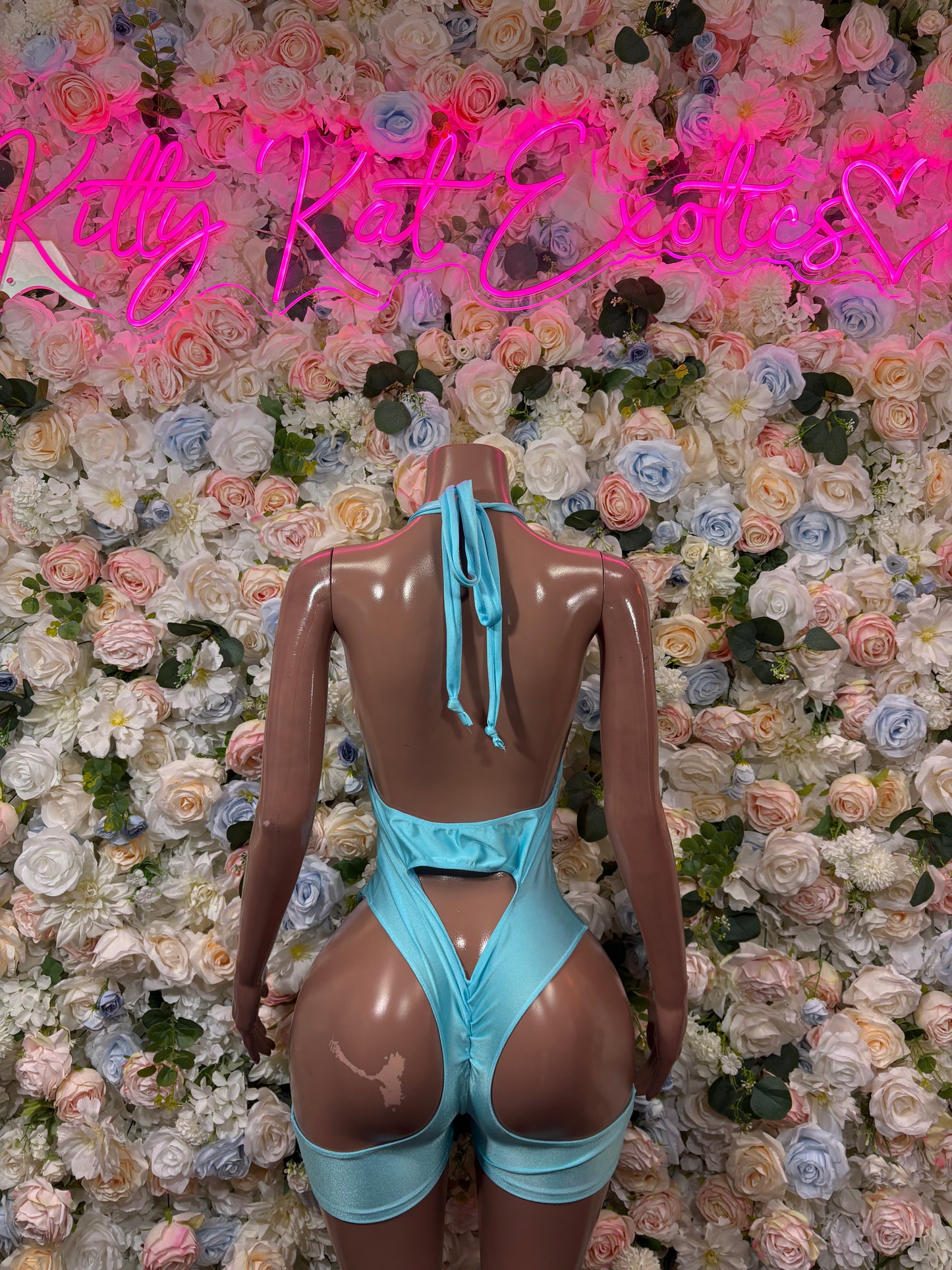 Teal backless bodysuit with crisscross lace tie at center back