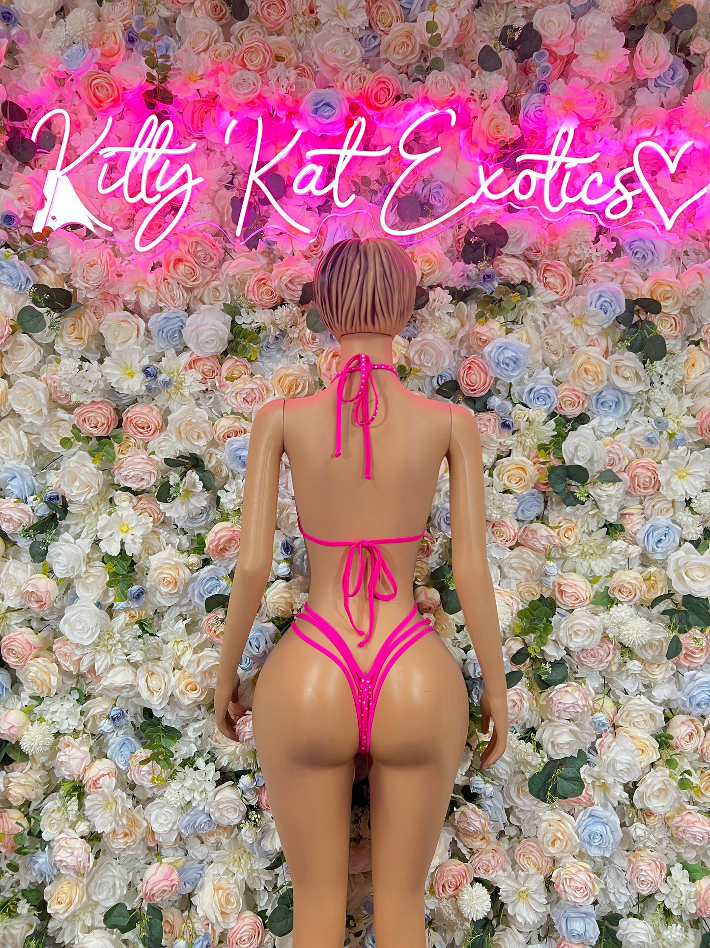 Pink rhinestone bikini set, back view with tie straps and high-cut bottoms.