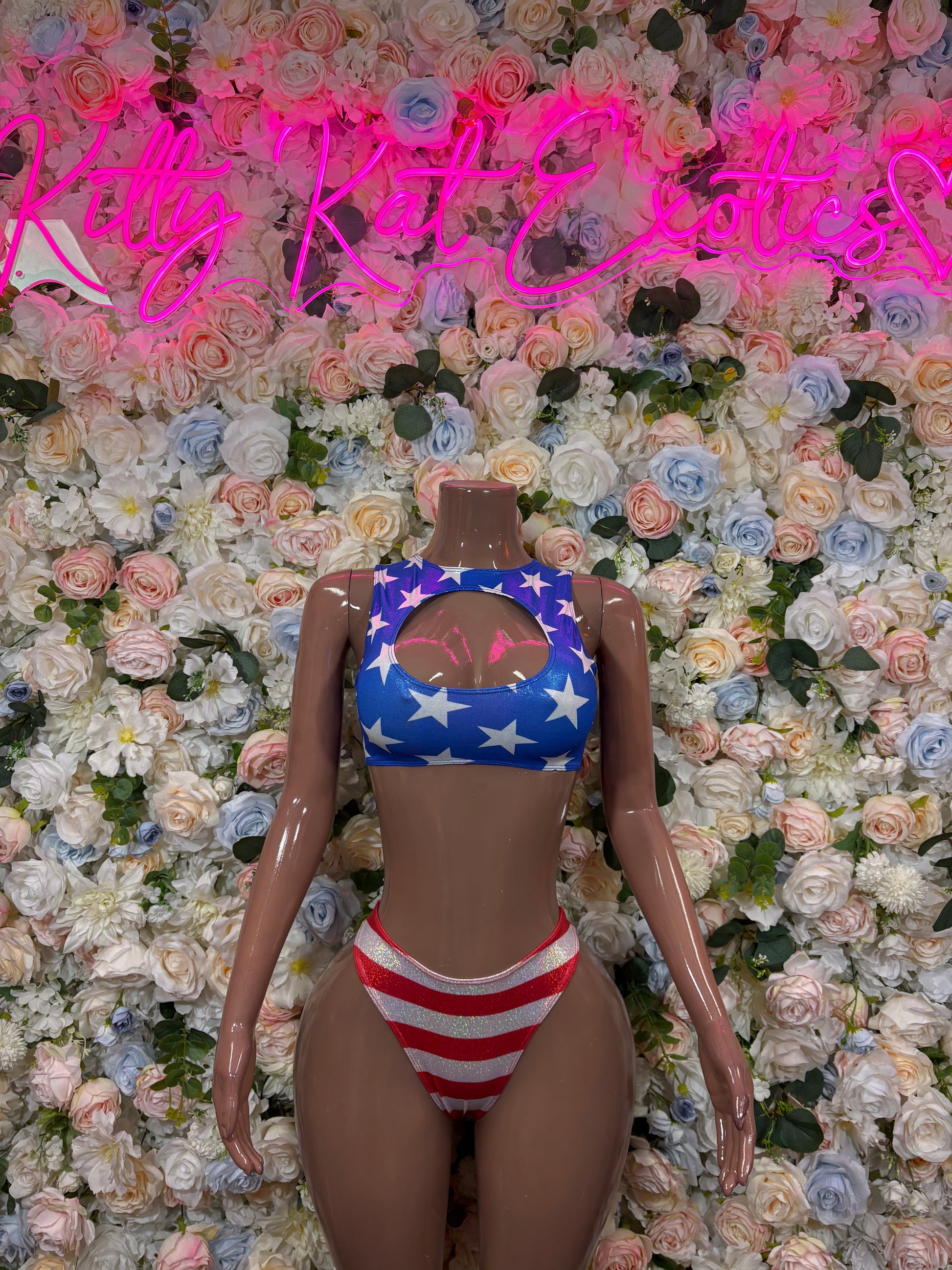 Patriotic two-piece swimsuit with blue star top and red-white striped bottom