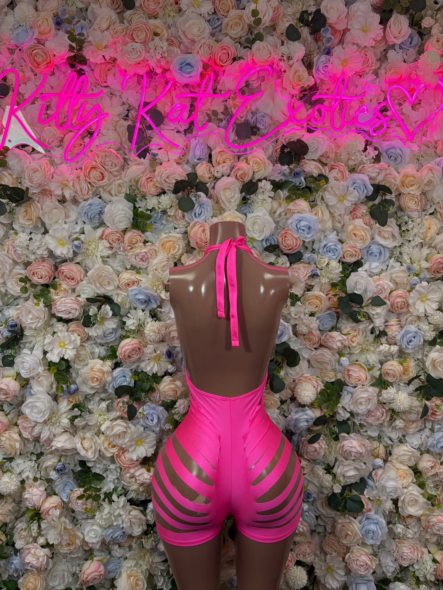 Hot pink backless bodysuit with ribbon tie and cutout sides