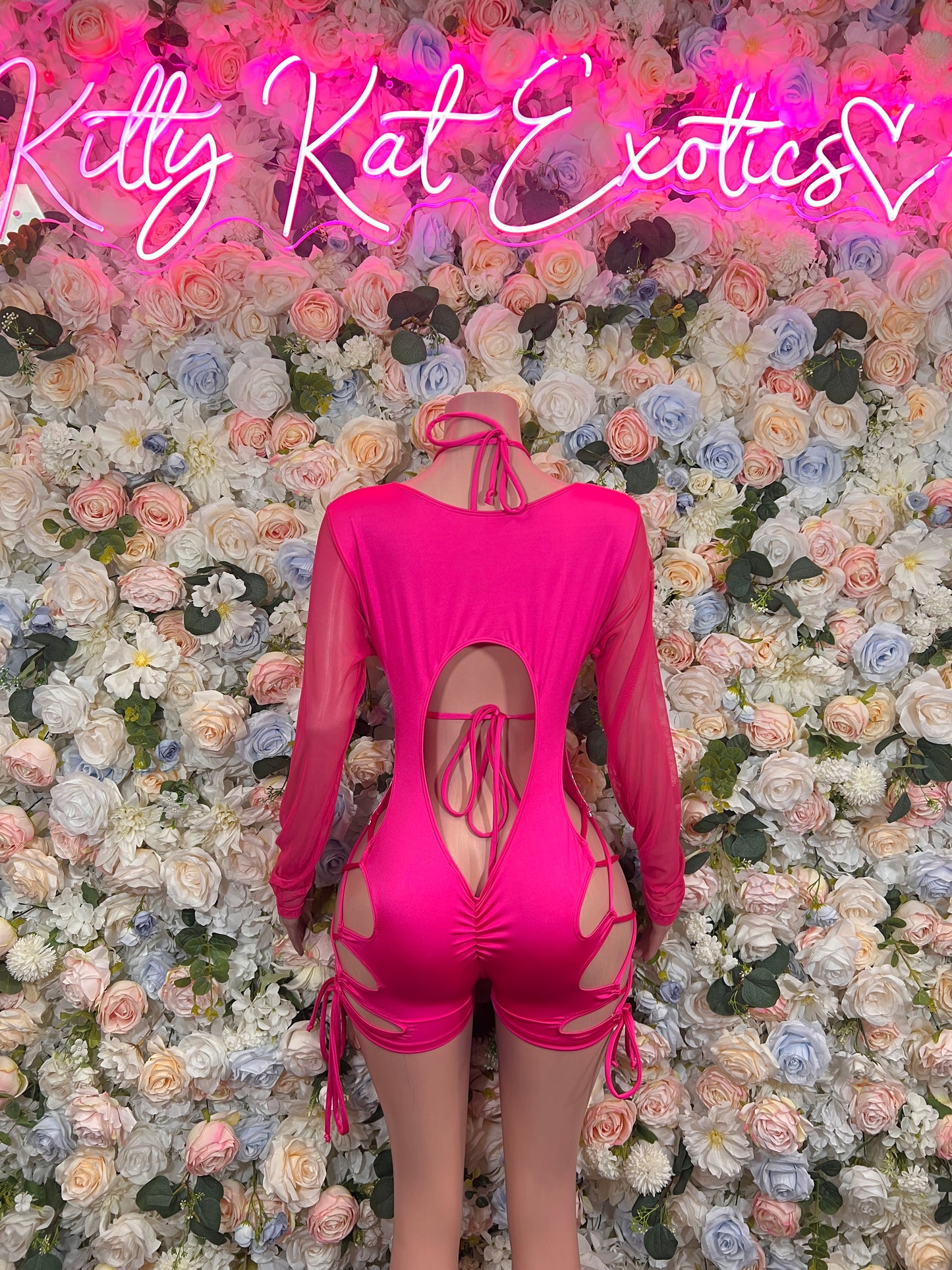 Hot pink metallic cheetah one-piece bodysuit with long sleeves and open back tie