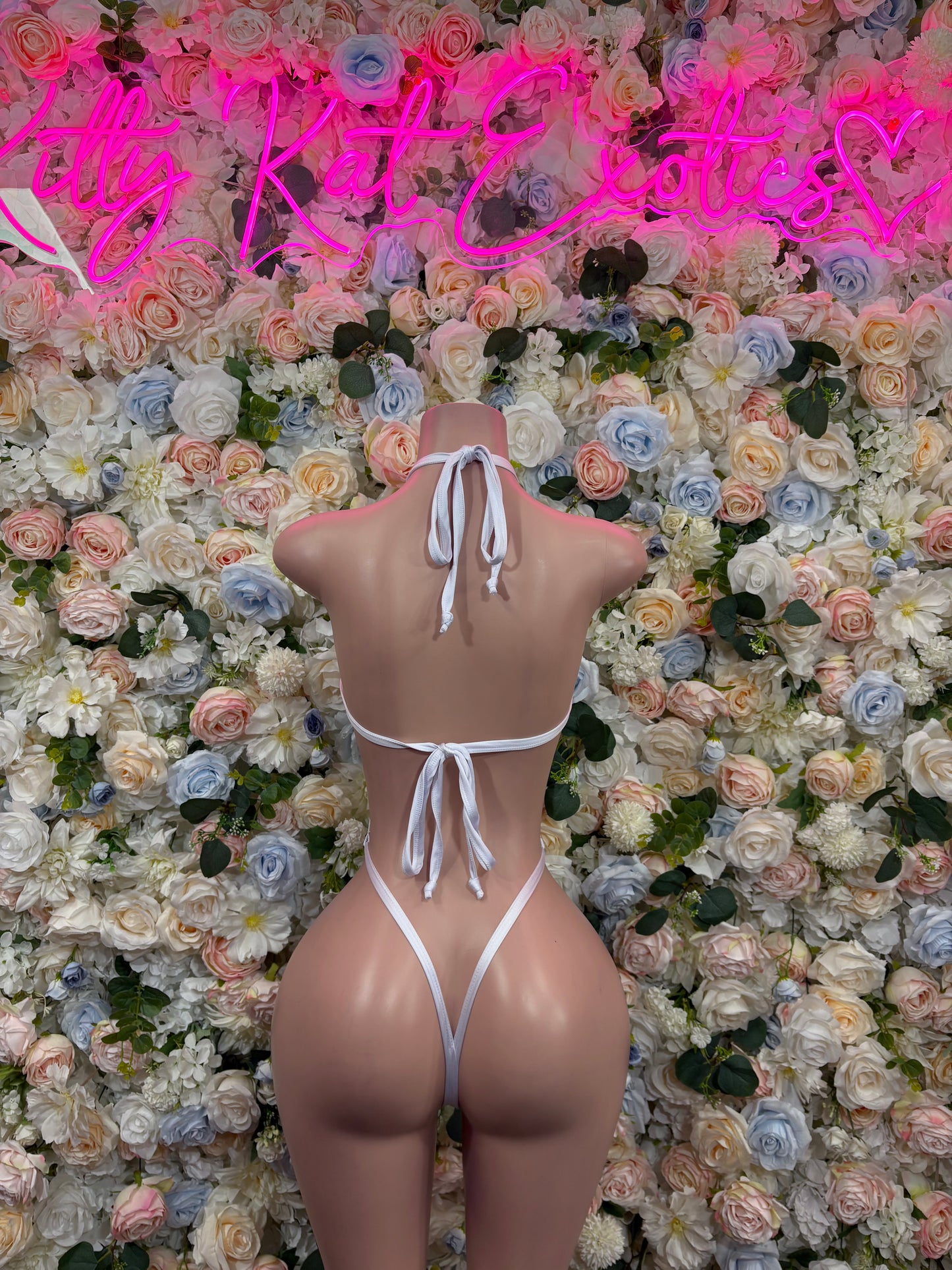 Silver hologram cheetah-print bodysuit with halter ties and open V back