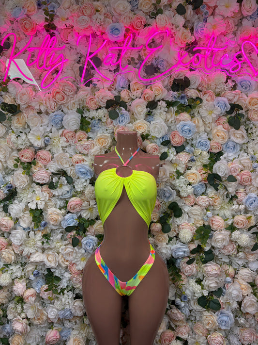 Neon two-piece bikini in bright lime green with rainbow straps and triangle bottoms