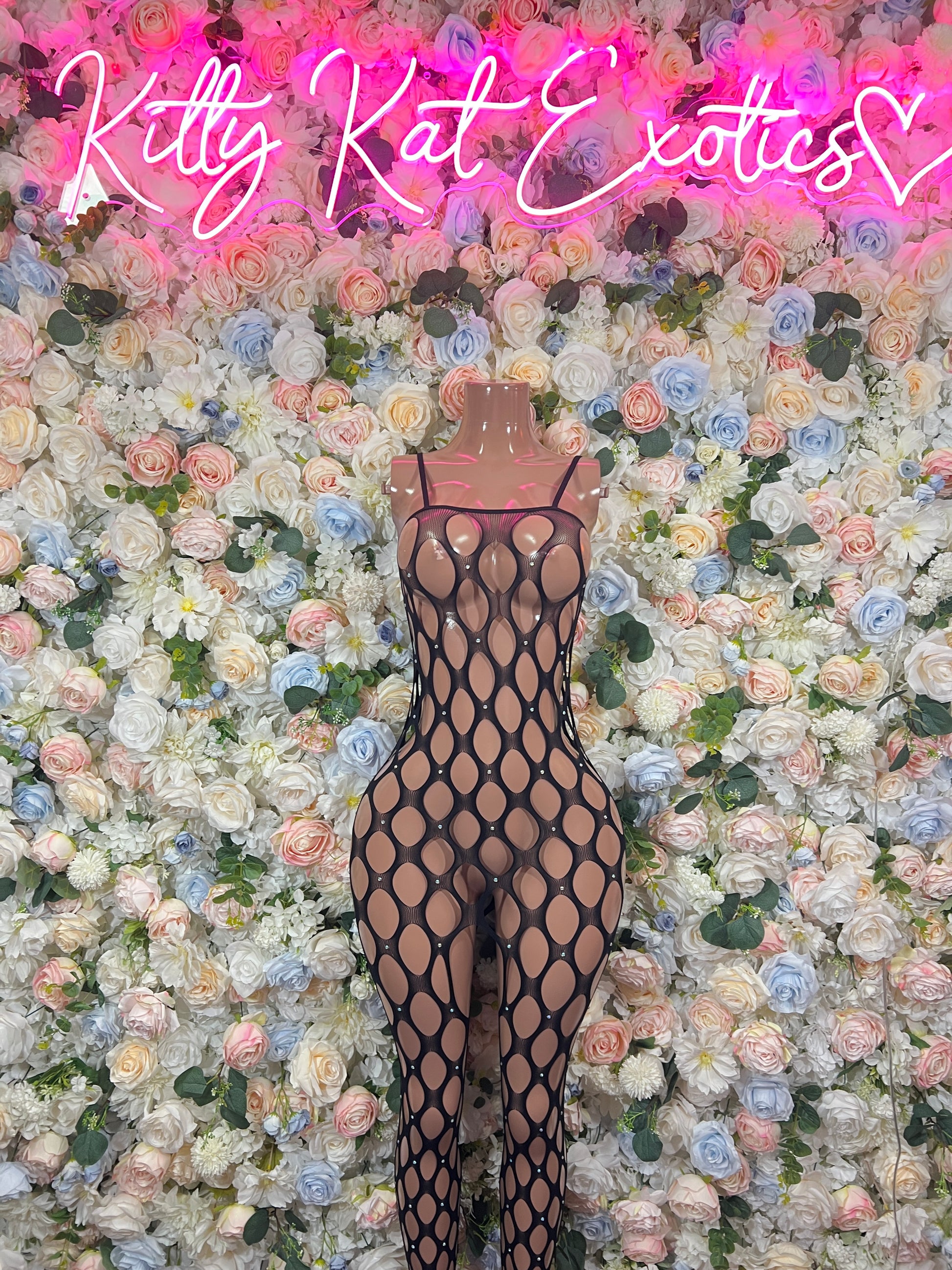 Black fishnet halter bodysuit with diamond-ring openwork pattern