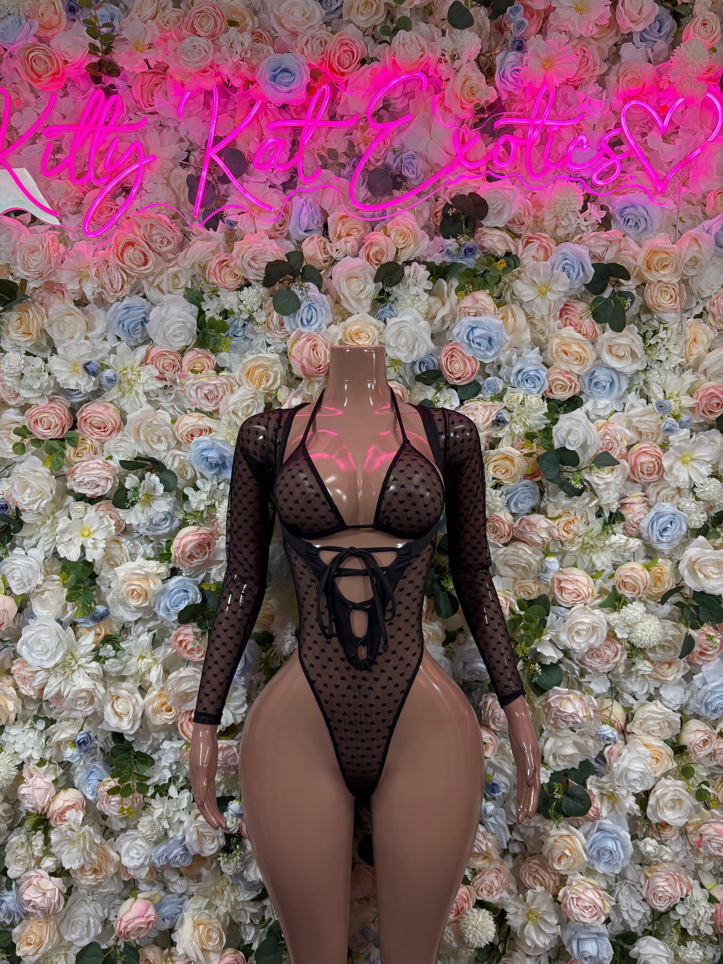 Black mesh bodysuit, long sleeves, heart pattern, front lace-up and cutout