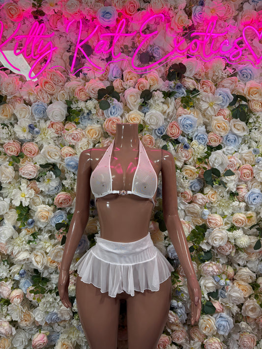 White two-piece mini skirt set with ruched cropped bra and layered pleated skirt
