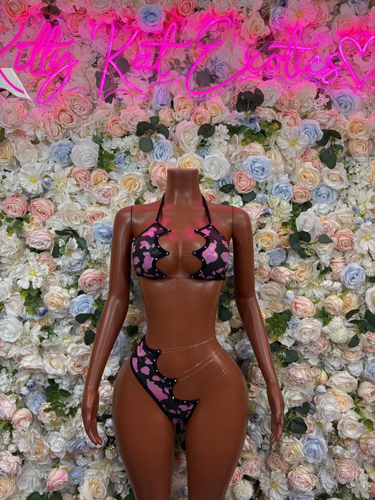 Cow print bikini set with pink and black hologram, front view on mannequin