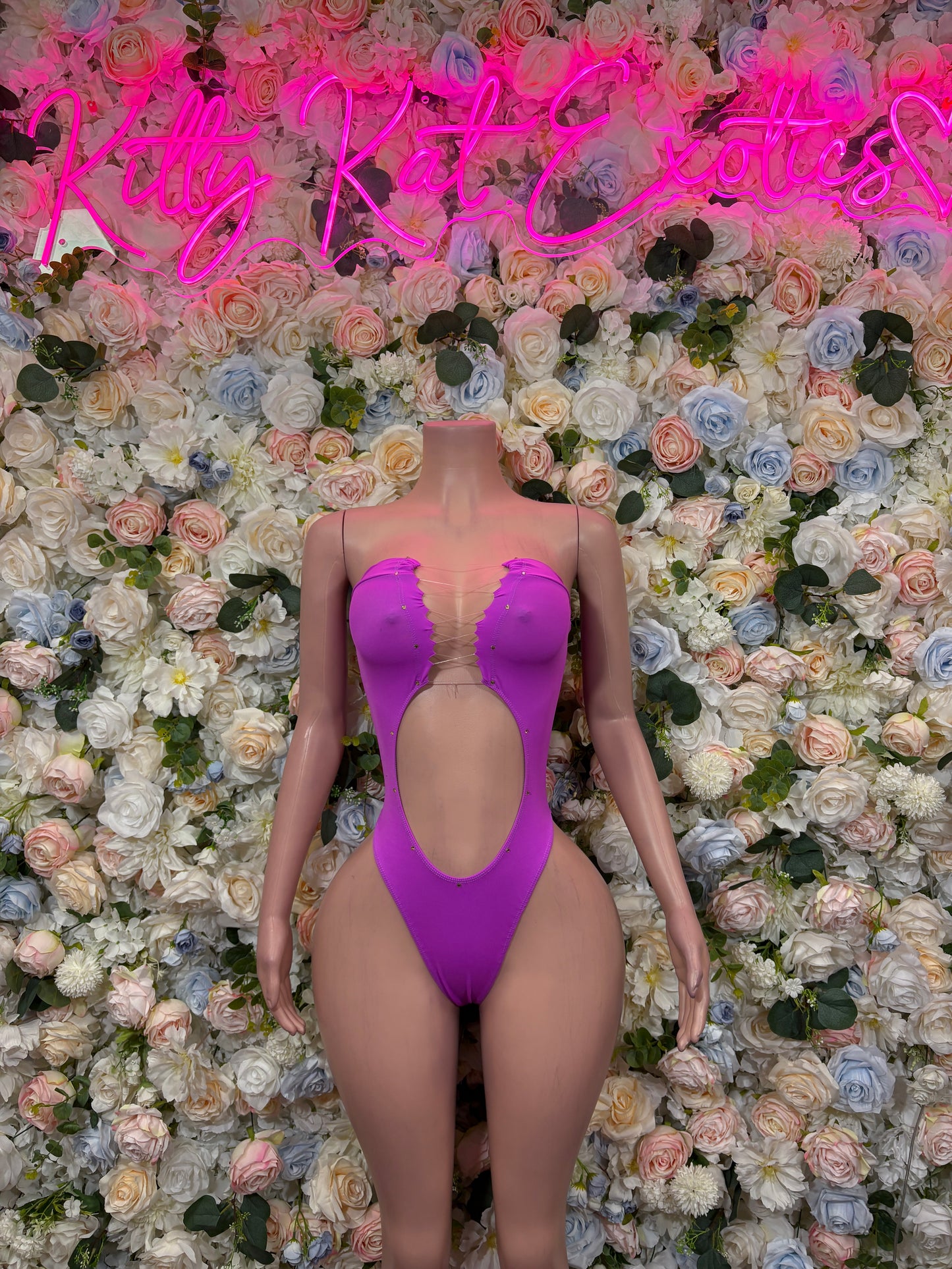Purple one-piece rave outfit with scalloped ruched cups and plunging back