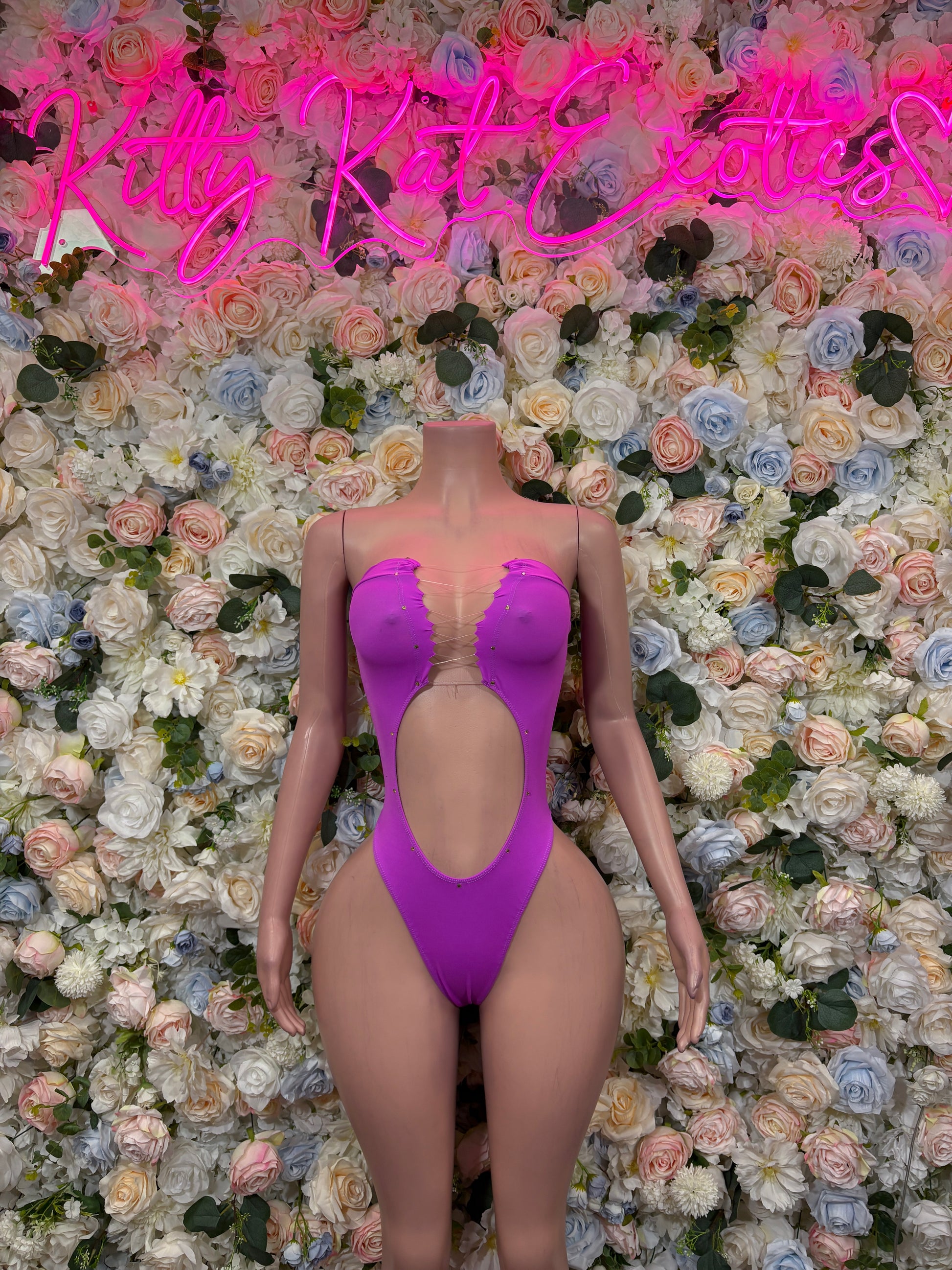 Purple one-piece rave outfit with scalloped ruched cups and plunging back