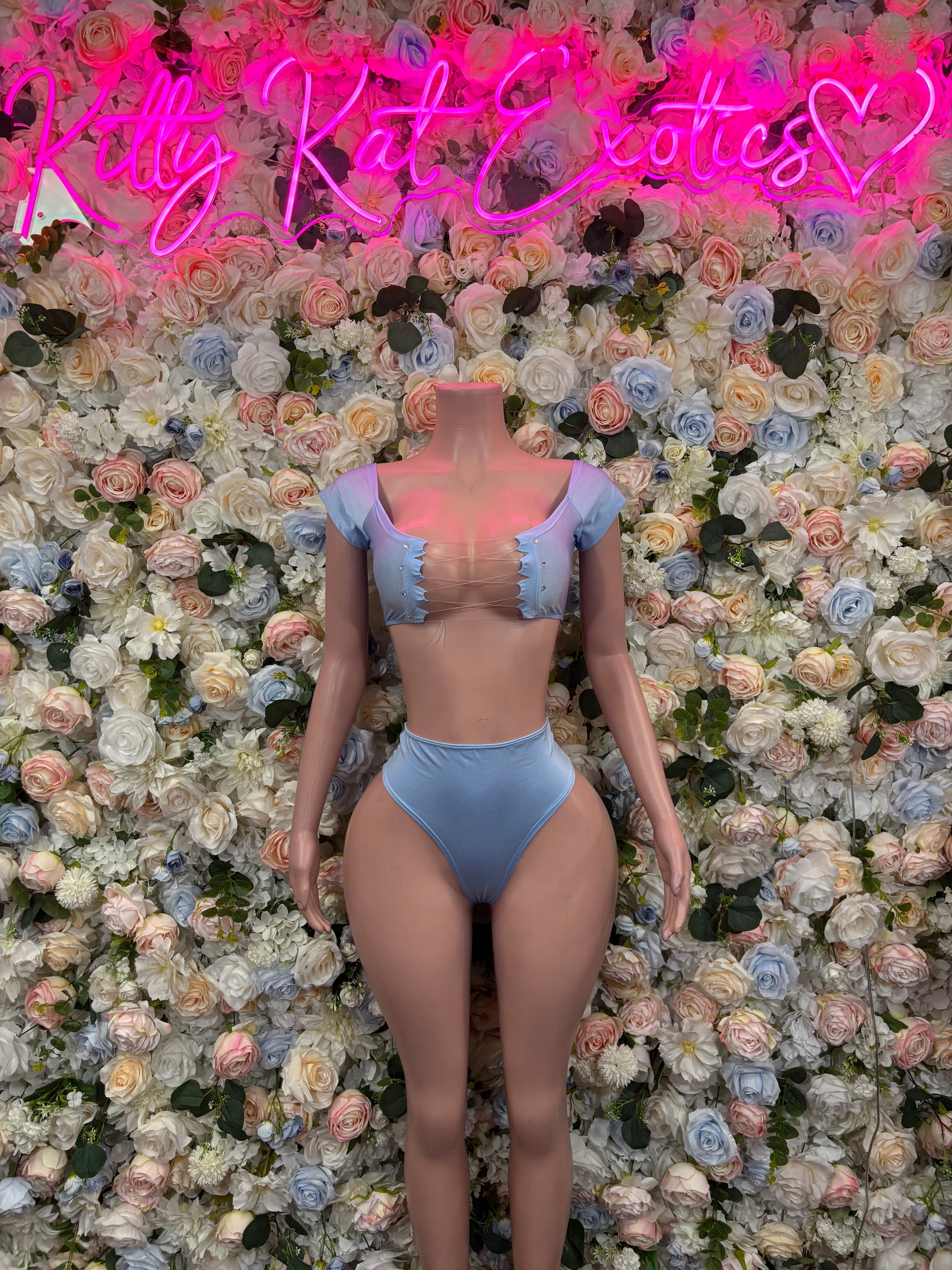 Baby blue two-piece rave outfit with ruched bandeau top and high-waist bottoms