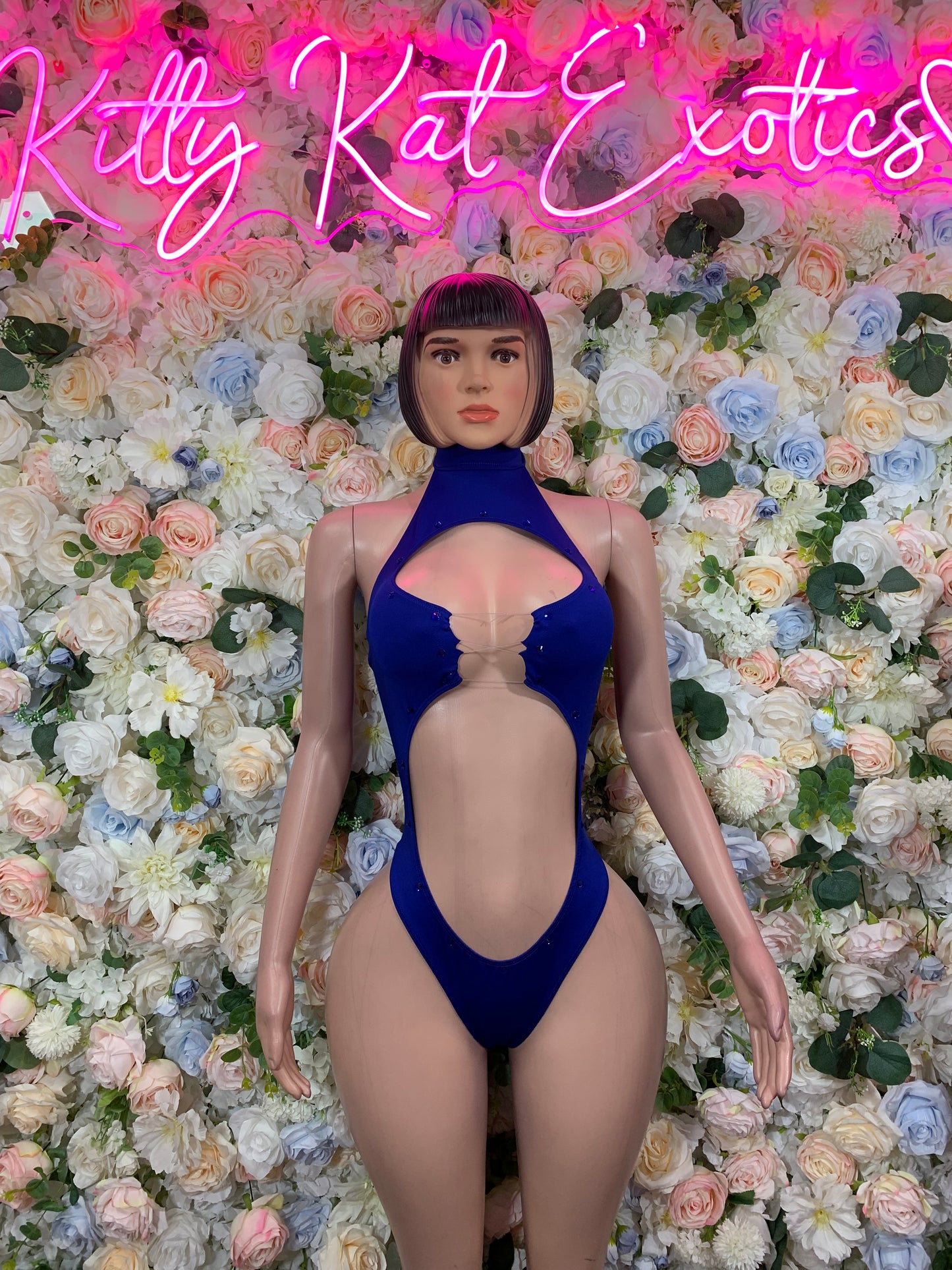 Blue one-piece bodysuit with front cutout chest and high-cut legs, sleeveless thong