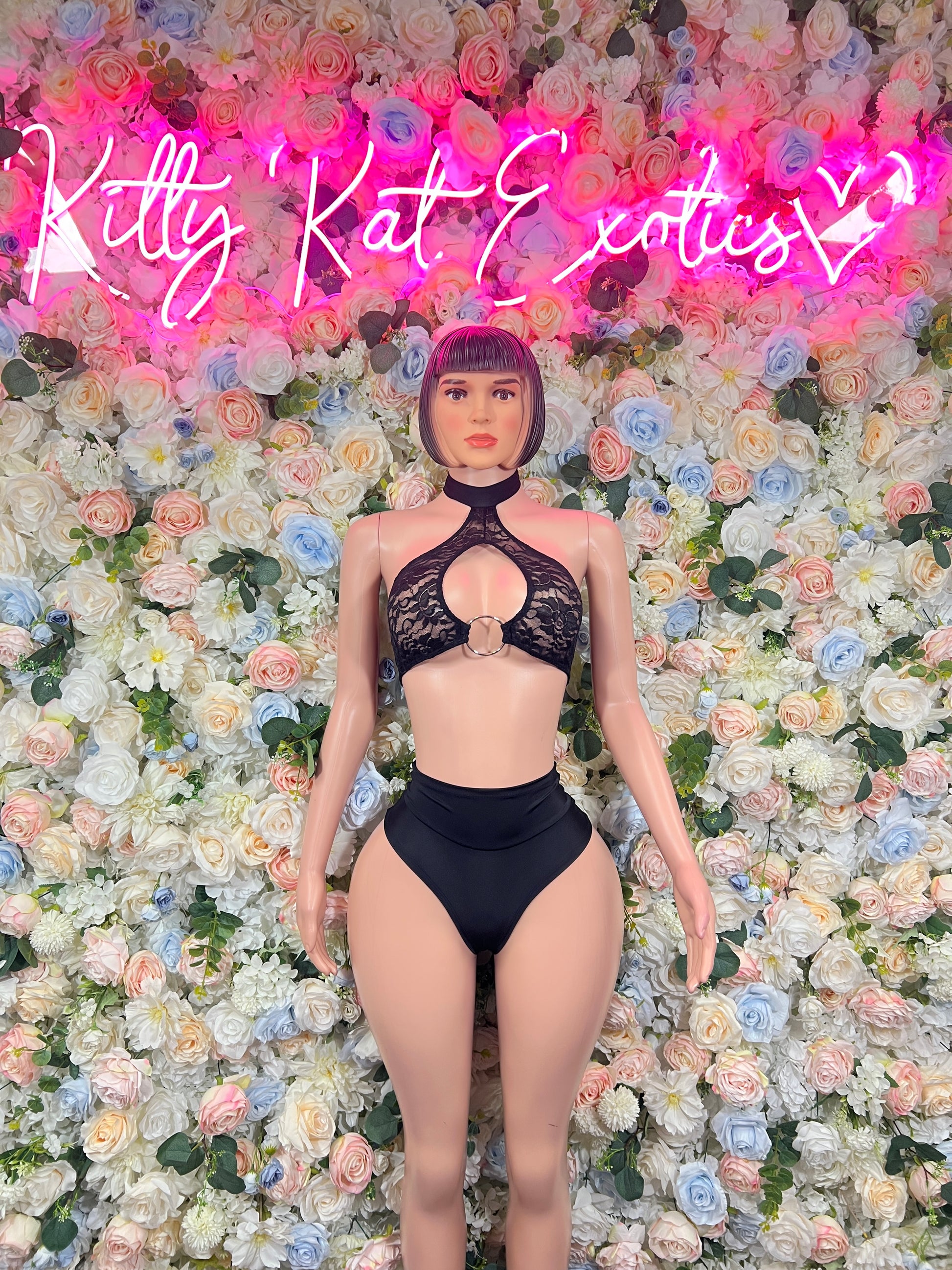 Black two-piece rave outfit: halter bra and high-leg thong bottoms