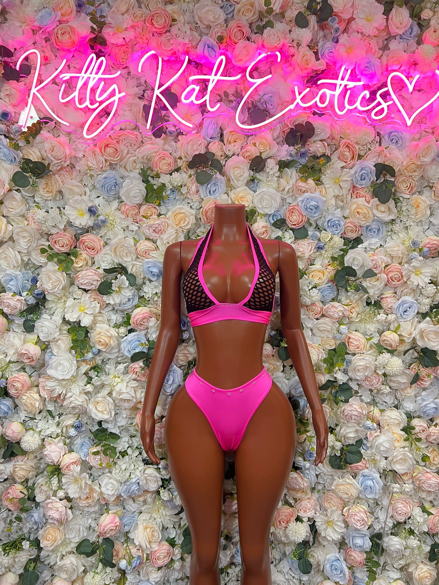 Pink and black fishnet two-piece bikini set, halter top with openwork panel and bottoms