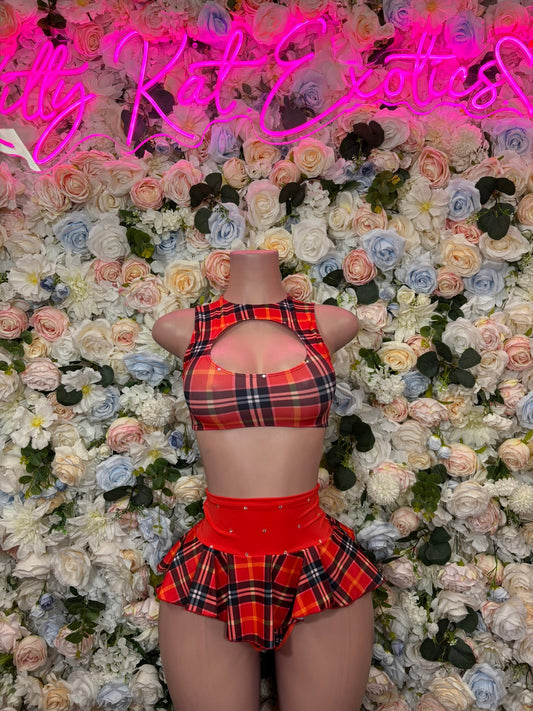 Red plaid halter crop top with open back and ruffled mini skirt