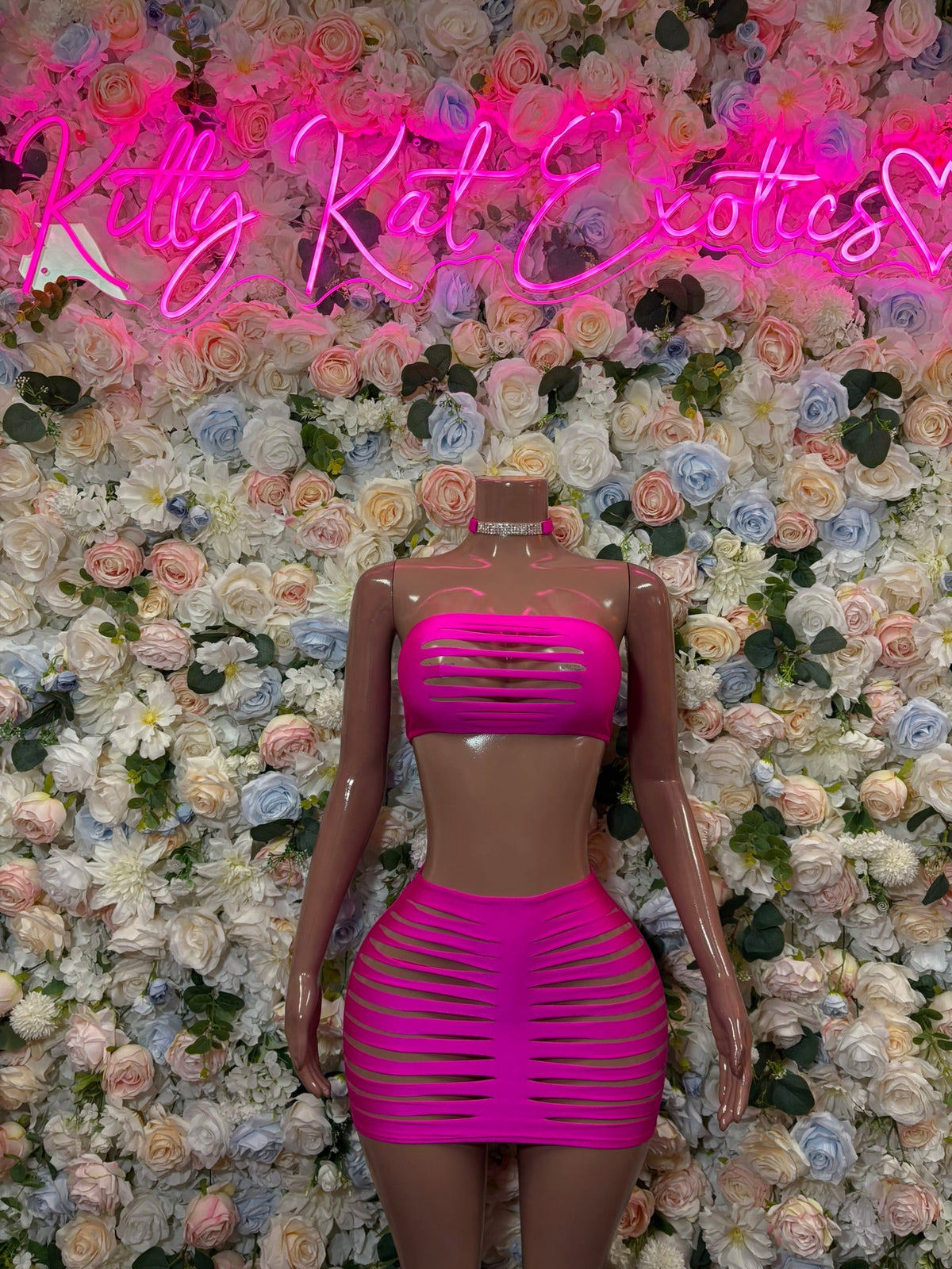 Hot pink strappy cutout mini dress with horizontal ribbed cutouts