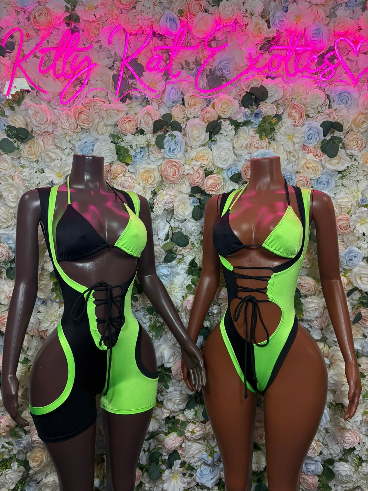 Neon green triangle top black cutout romper with center lace-up