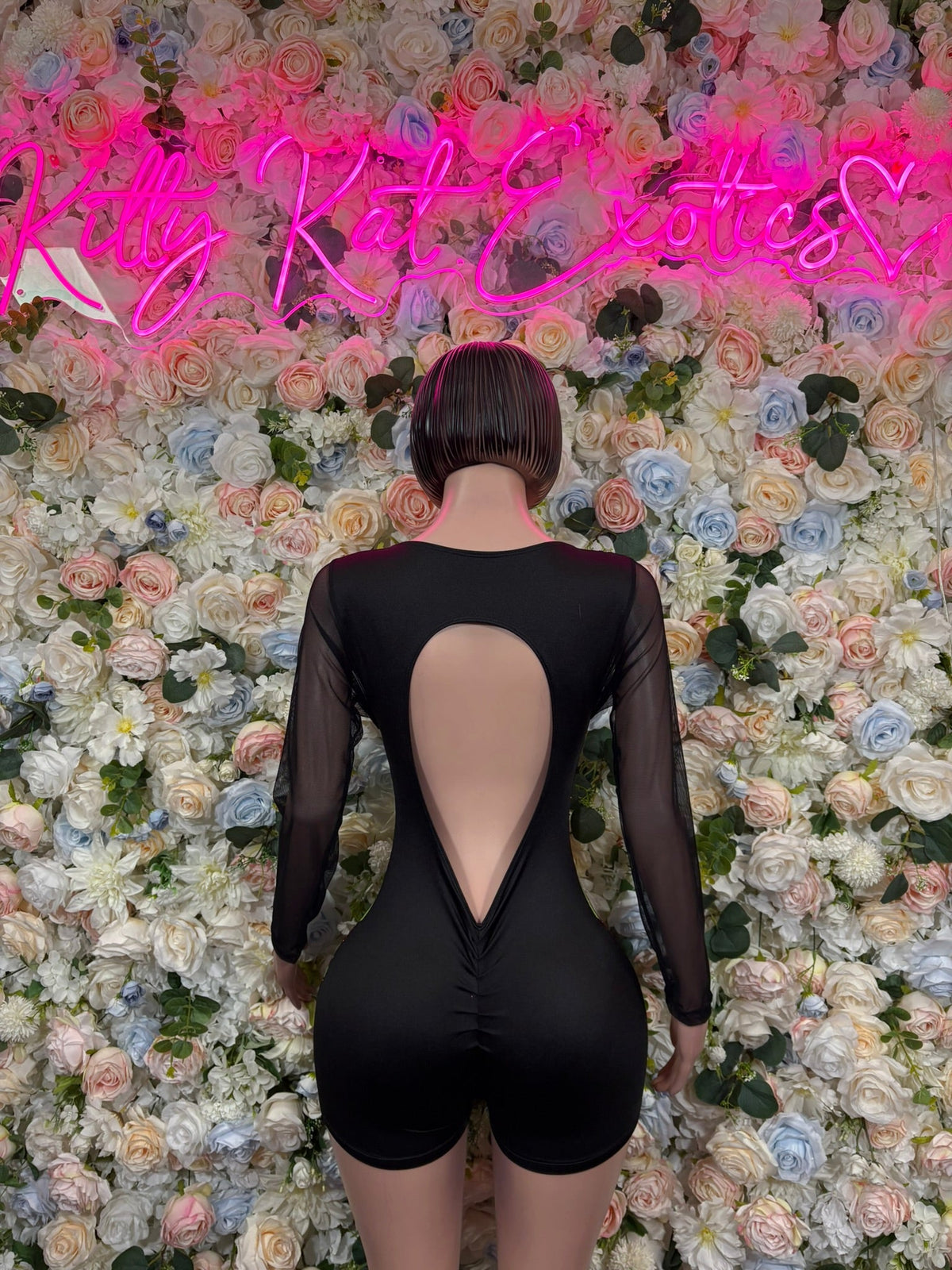 Black sheer long-sleeve bodysuit with keyhole open back and green flame print