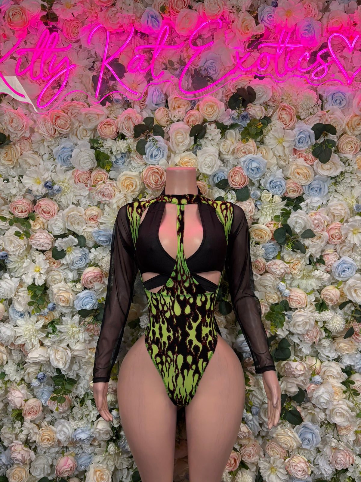 Black and neon green flame long-sleeve bodysuit with mesh cutouts and open back