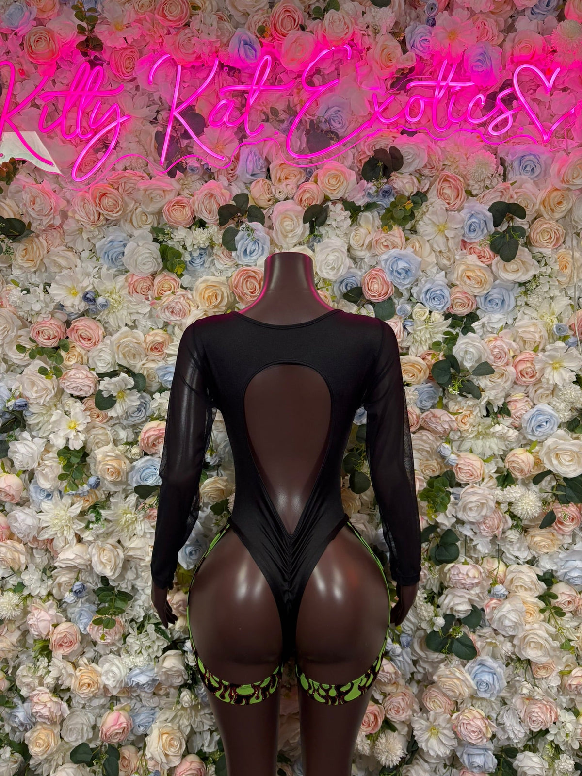 Black sheer long-sleeve bodysuit with deep back cutout and neon flame trim