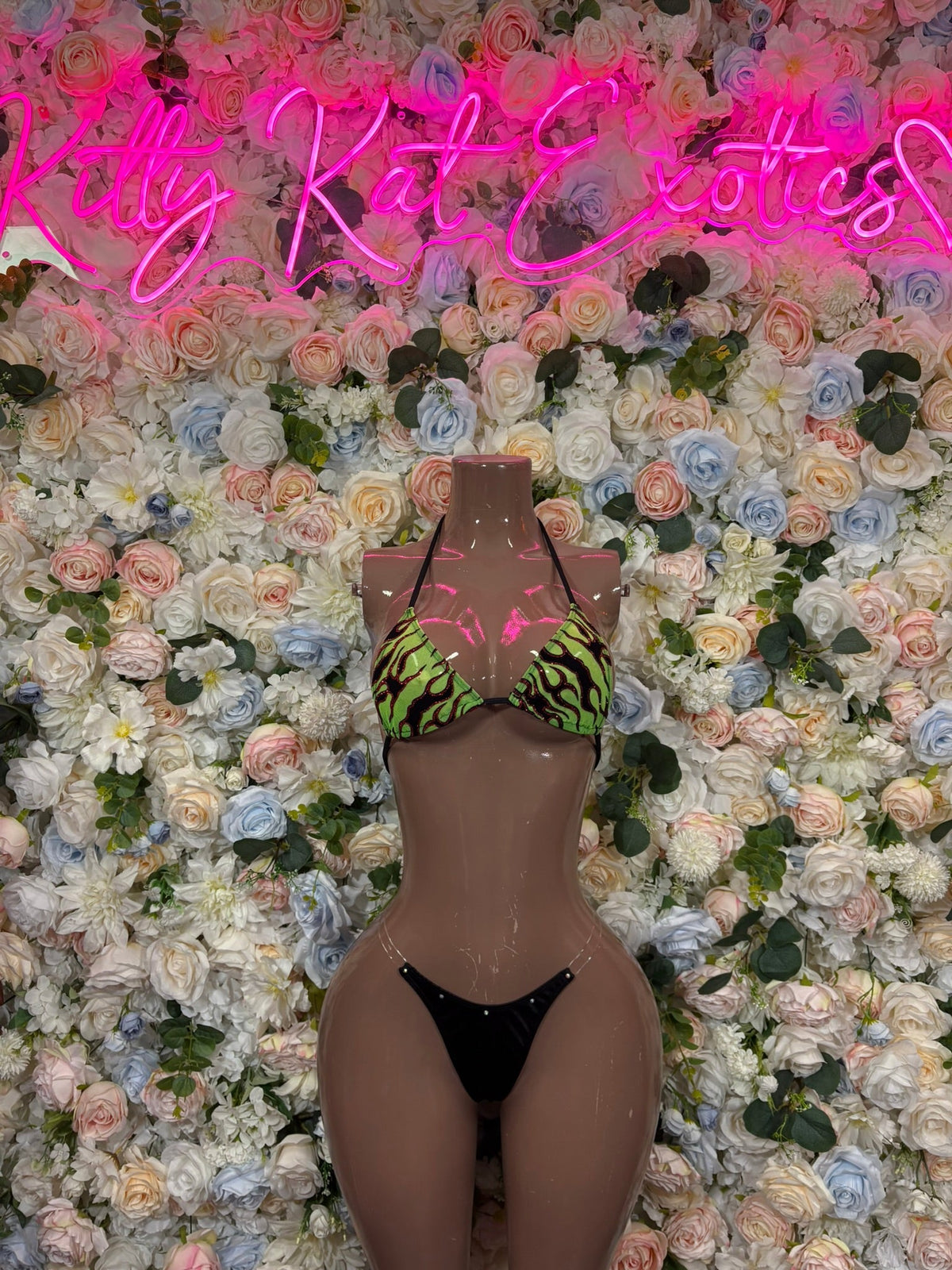 High-cut neon green print bikini set with plunging V-front and black bottoms