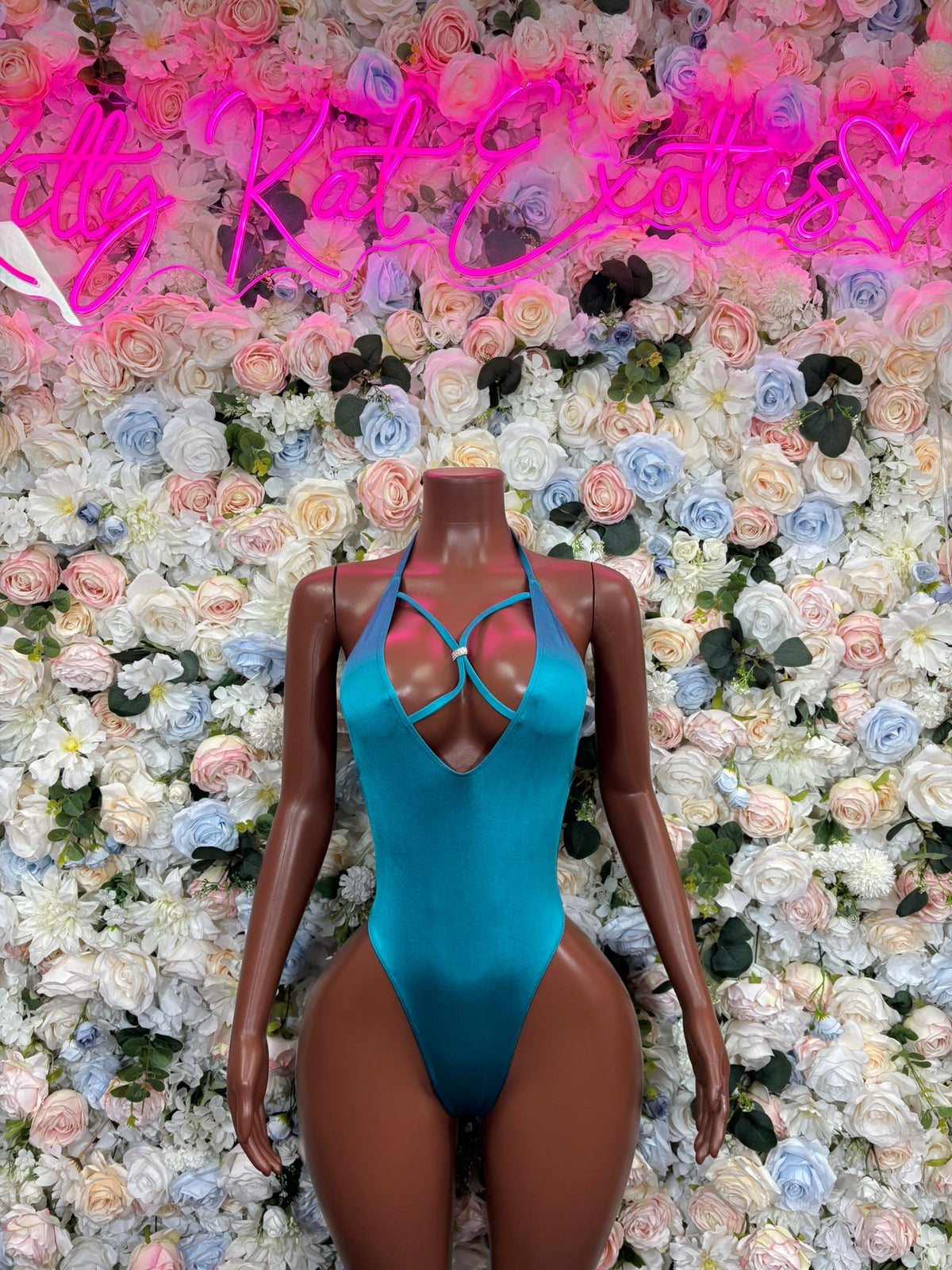 Teal halter cutout bodysuit with open back and V-shaped chest cutout