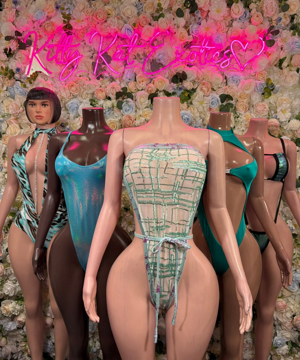 Group photo featuring Teal Ring Cutout Rave Bodysuit and coordinating KittyKatExotics rave festival styles
