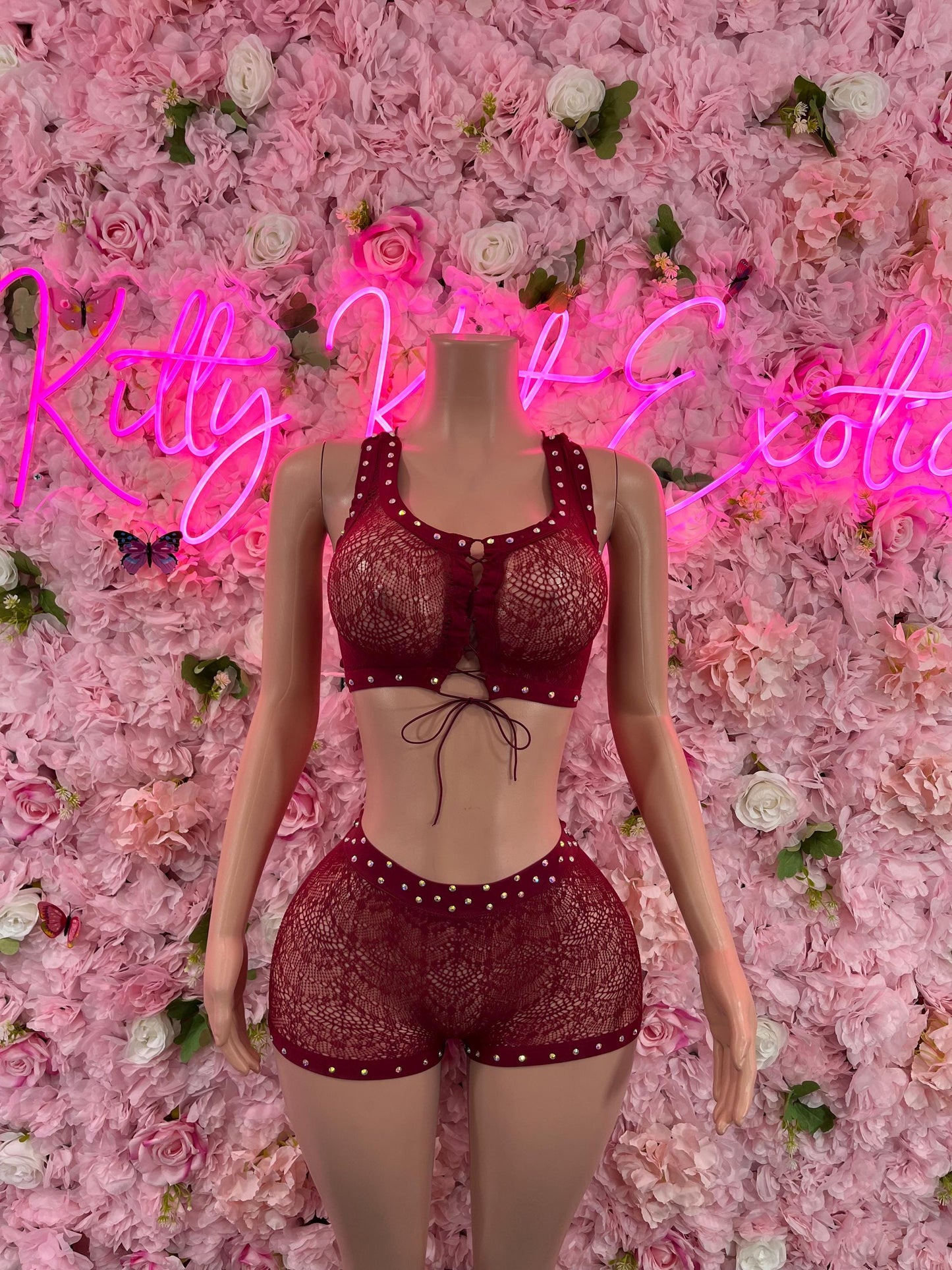 Two-piece fishnet dance set in burgundy with sparkly trim, front tie bra and shorts