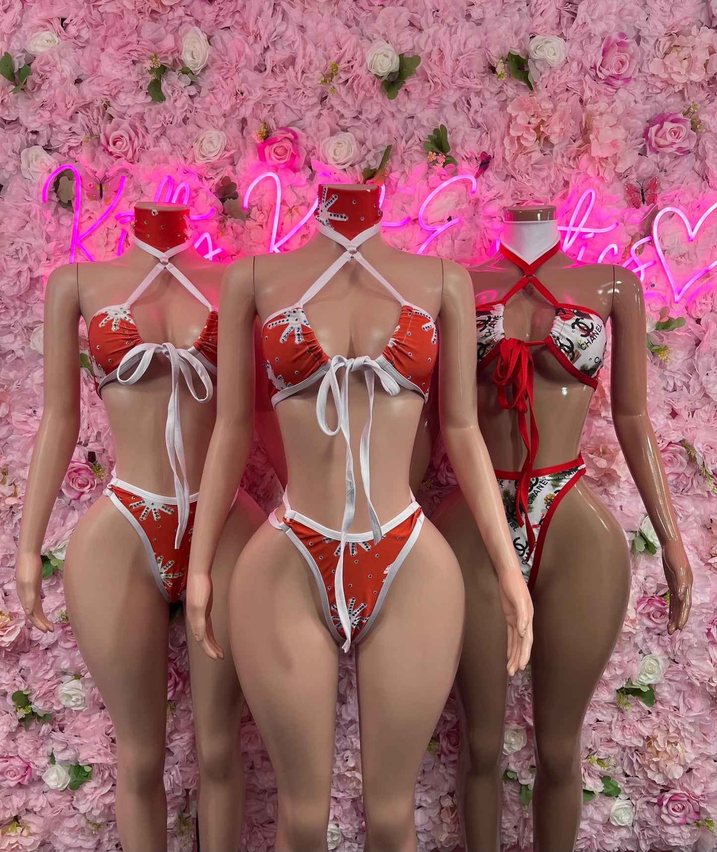 Red two-piece lingerie set with white bows, cutout sides and strappy back