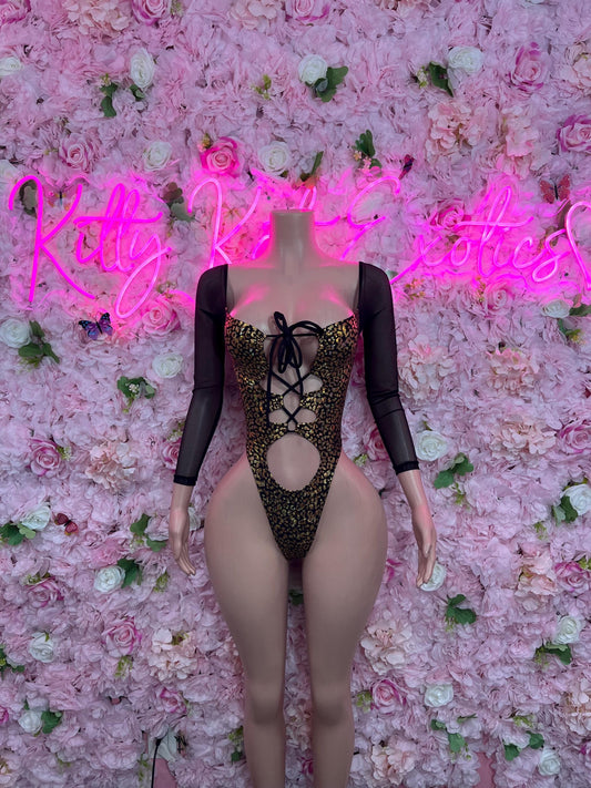 Black sheer long-sleeve one-piece bodysuit with gold cheetah print and lace-up front cutouts