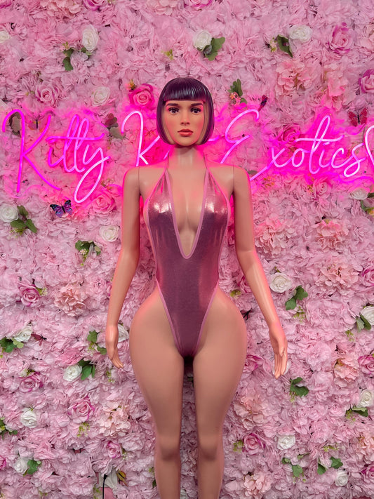 Pink one-piece dance bodysuit with deep V neckline and high-cut legs, sleeveless