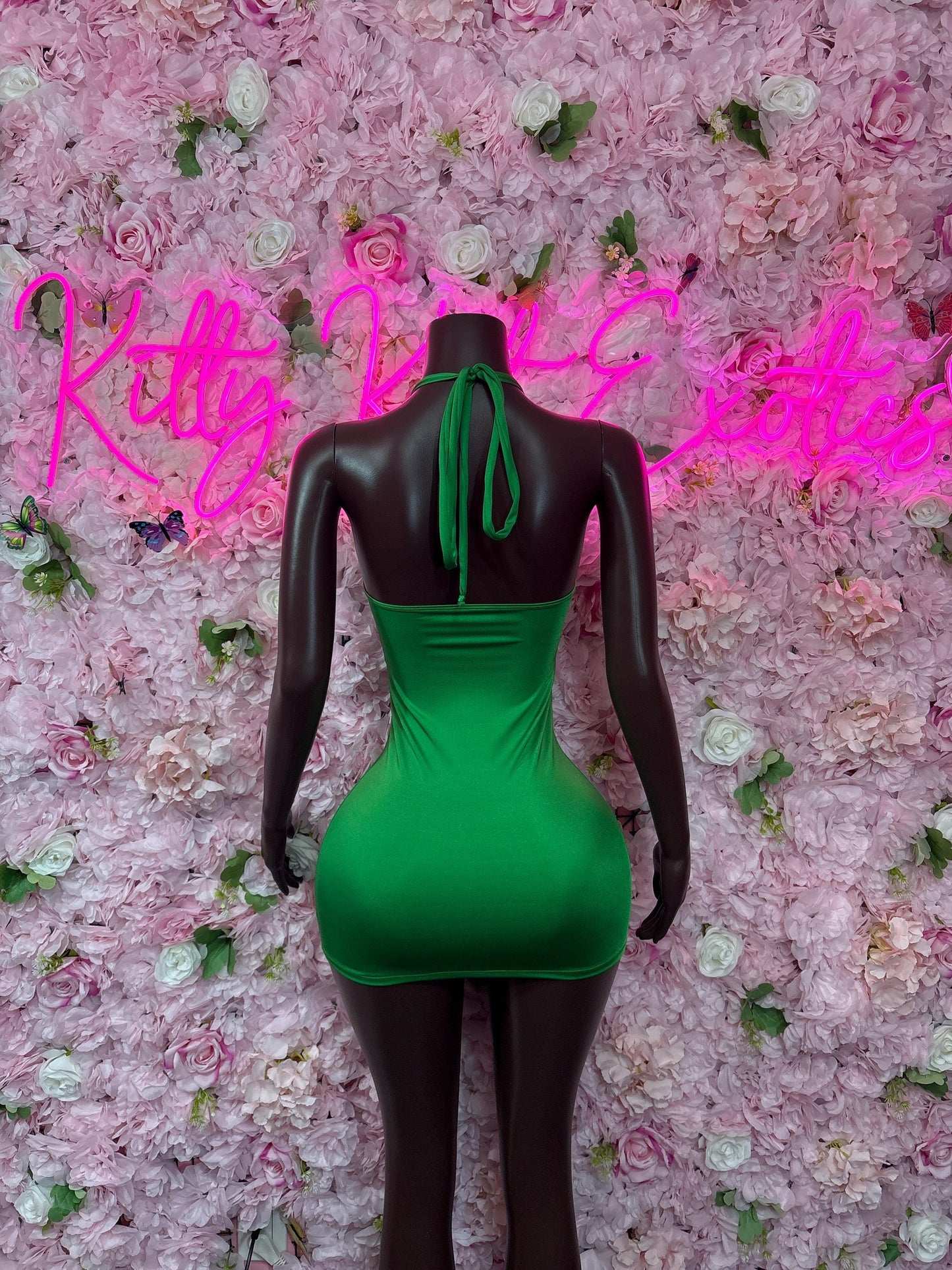 Green cutout one-piece dress with halter back and black long sleeves