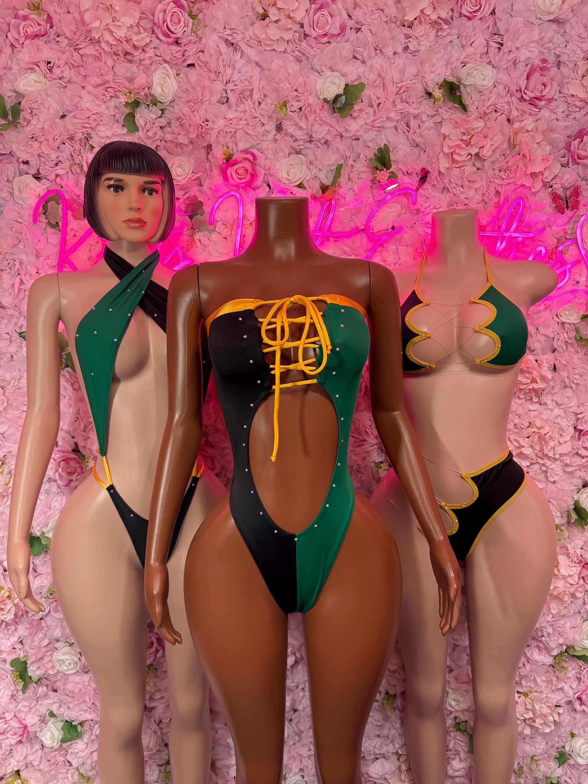 Jamaica flag one-piece swimsuit with black, green panels and yellow trim, front view