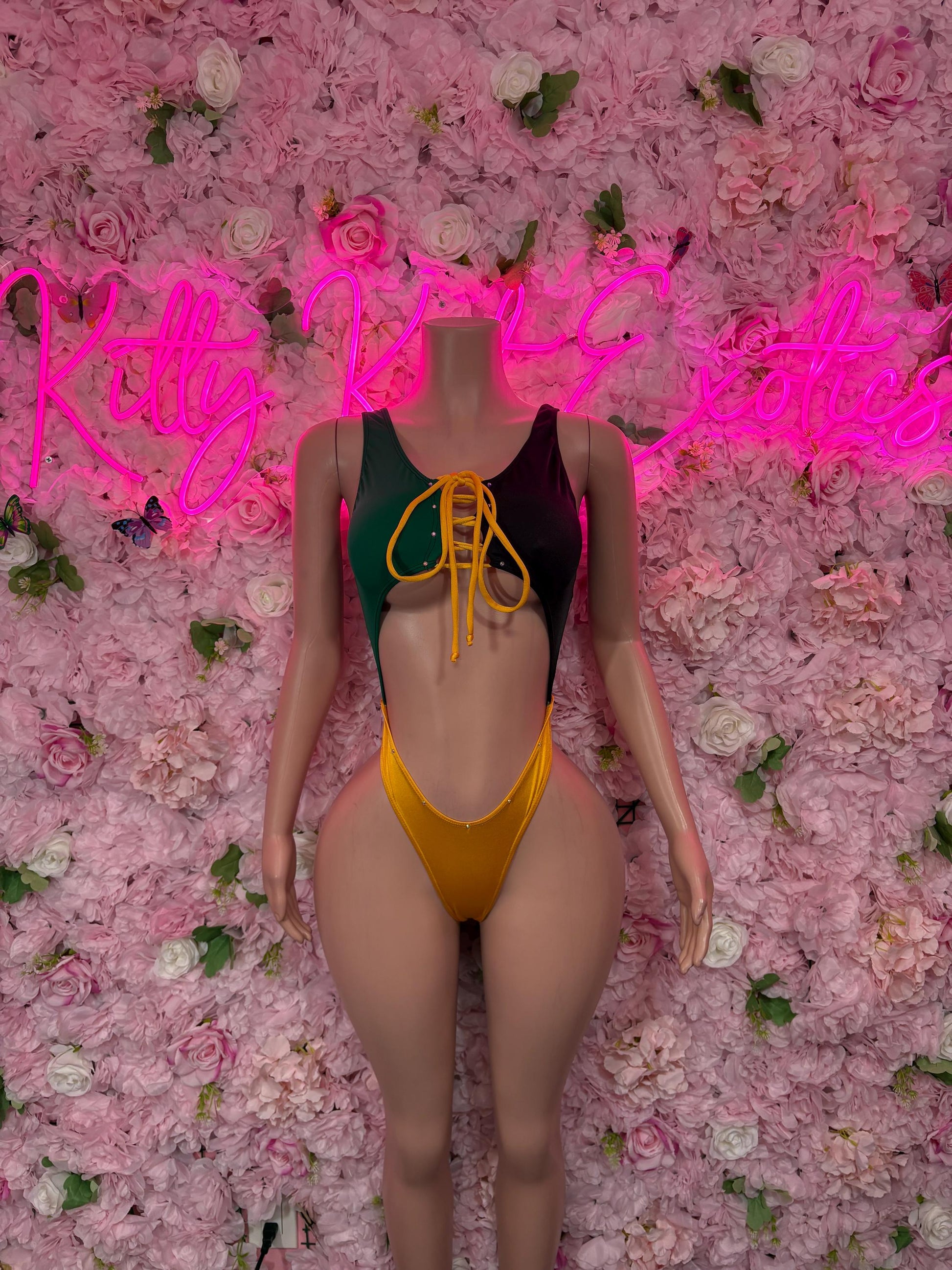 Jamaica flag one-piece swimsuit with lace-up front, green and gold panels on dark base